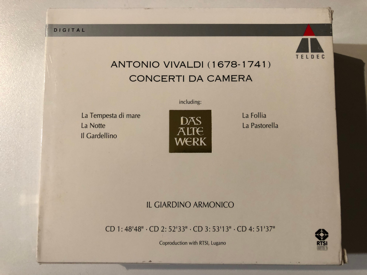 https://cdn10.bigcommerce.com/s-62bdpkt7pb/products/0/images/293716/Antonio_Vivaldi_Concerti_Da_Camera_Complete_Recording_-_Il_Giardino_Armonico_Das_Alte_Werk_Teldec_4x_Audio_CD_Box_Set_9031-77040-2_2__28160.1692192269.1280.1280.JPG?c=2&_gl=1*1x9ekb9*_ga*MjA2NTIxMjE2MC4xNTkwNTEyNTMy*_ga_WS2VZYPC6G*MTY5MjE4OTA1NS4xMDMwLjEuMTY5MjE5MjI2My42MC4wLjA.