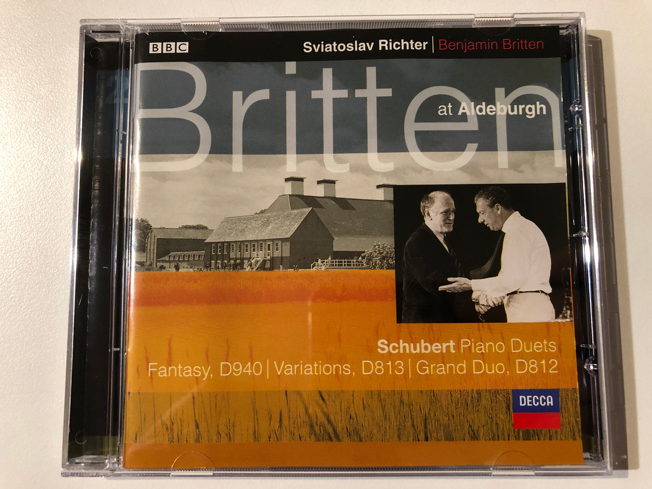 https://cdn10.bigcommerce.com/s-62bdpkt7pb/products/0/images/293969/Sviatoslav_Richter_Benjamin_Britten_Britten_at_Aldeburgh_-_Schubert_Piano_Duets_Fantasy_D_940_Variations_D_813_Grand_Duo_D_812_Decca_Audio_CD_2000_466_822-2_1__55775.1692206932.1280.1280.JPG?c=2&_gl=1*o19nvb*_ga*MjA2NTIxMjE2MC4xNTkwNTEyNTMy*_ga_WS2VZYPC6G*MTY5MjIwNjY4OS4xMDMxLjAuMTY5MjIwNjY4OS42MC4wLjA.