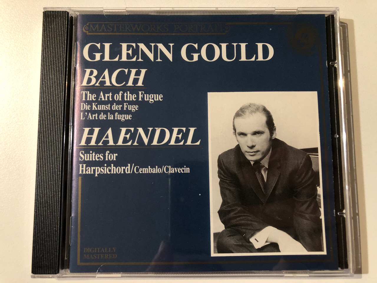 https://cdn10.bigcommerce.com/s-62bdpkt7pb/products/0/images/294107/Glenn_Gould_-_Bach_Bach_The_Art_Of_The_Fugue_Haendel_Suites_For_Harpsichord_Masterworks_Portrait_CBS_Masterworks_Audio_CD_1988_MPK_44841_1__62258.1692255914.1280.1280.JPG?c=2&_gl=1*17r3rwt*_ga*MjA2NTIxMjE2MC4xNTkwNTEyNTMy*_ga_WS2VZYPC6G*MTY5MjI1MDA5Ny4xMDMzLjEuMTY5MjI1NTU3MS40My4wLjA.