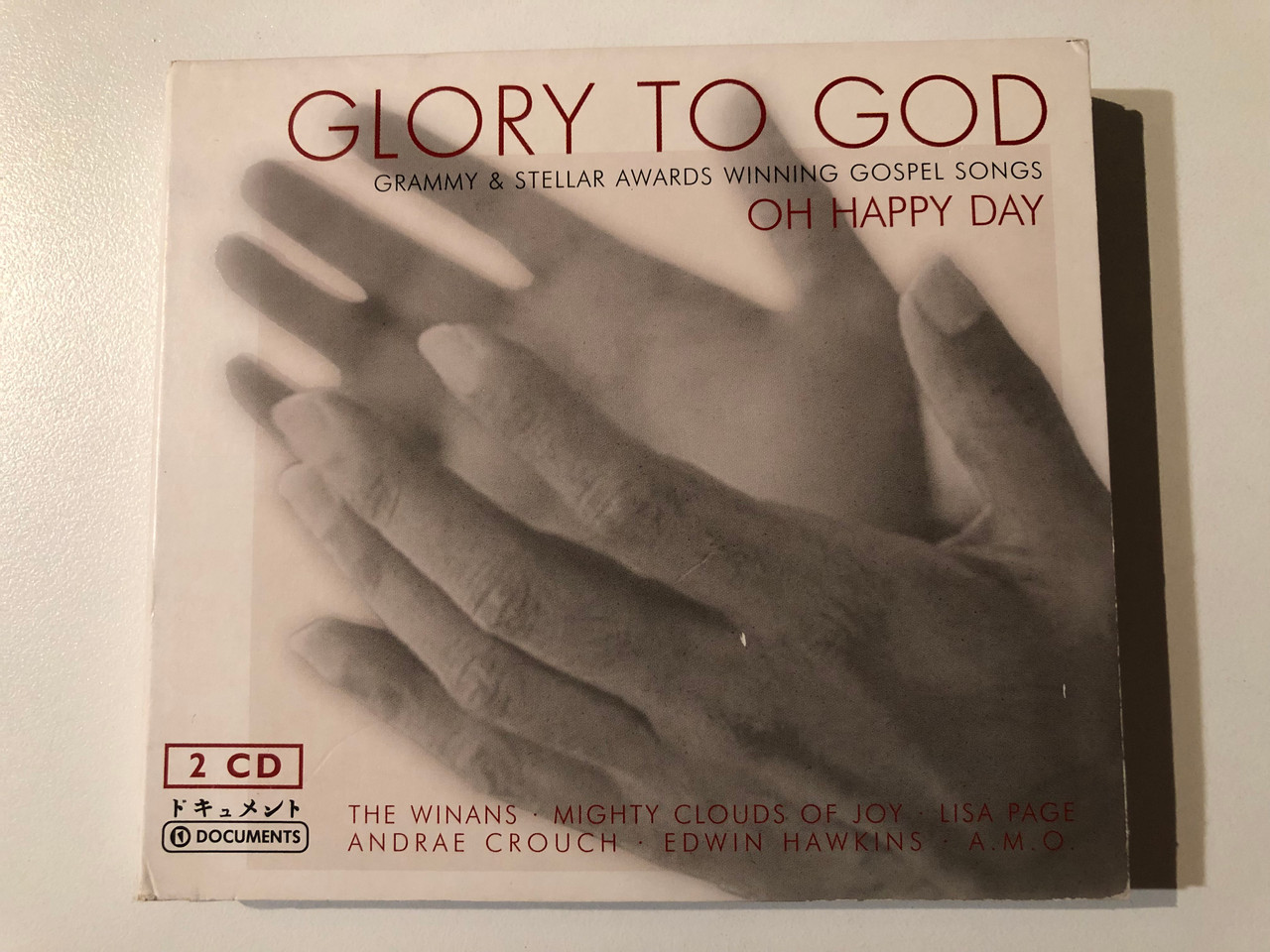 https://cdn10.bigcommerce.com/s-62bdpkt7pb/products/0/images/294156/Glory_To_God_-_Oh_Happy_Day_Grammy_Stellar_Awards_Winning_Gospel_Songs_The_Winans_Mighty_Clouds_Of_Joy_Lisa_Page_Andra_Crouch_Edwin_Hawkins_A._M._O._Documents_2x_Audio_CD_2004_22_1__51347.1692268799.1280.1280.JPG?c=2&_gl=1*14i5jfn*_ga*MjA2NTIxMjE2MC4xNTkwNTEyNTMy*_ga_WS2VZYPC6G*MTY5MjI2NjY3MS4xMDM0LjEuMTY5MjI2ODUwOS40NS4wLjA.