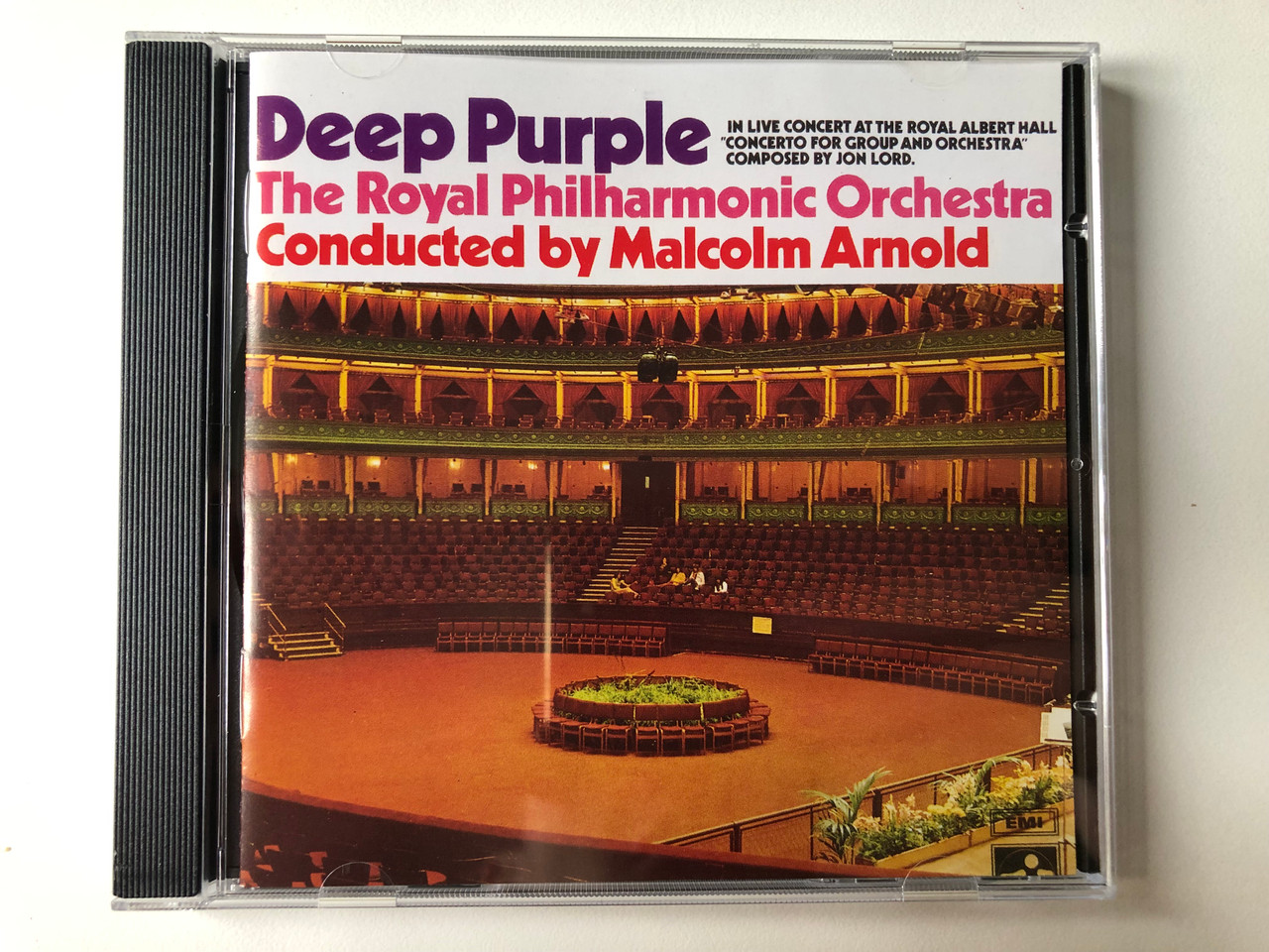https://cdn10.bigcommerce.com/s-62bdpkt7pb/products/0/images/296636/Deep_Purple_The_Royal_Philharmonic_Orchestra_Conducted_By_Malcolm_Arnold_Concerto_For_Group_And_Orchestra_Composed_By_Jon_Lord_EMI_Audio_CD_1990_7_94886_2_1__00611.1693232952.1280.1280.JPG?c=2&_gl=1*1ilcd38*_ga*MjA2NTIxMjE2MC4xNTkwNTEyNTMy*_ga_WS2VZYPC6G*MTY5MzIyNzczNi4xMDQ4LjEuMTY5MzIzMjk1Ni42MC4wLjA.