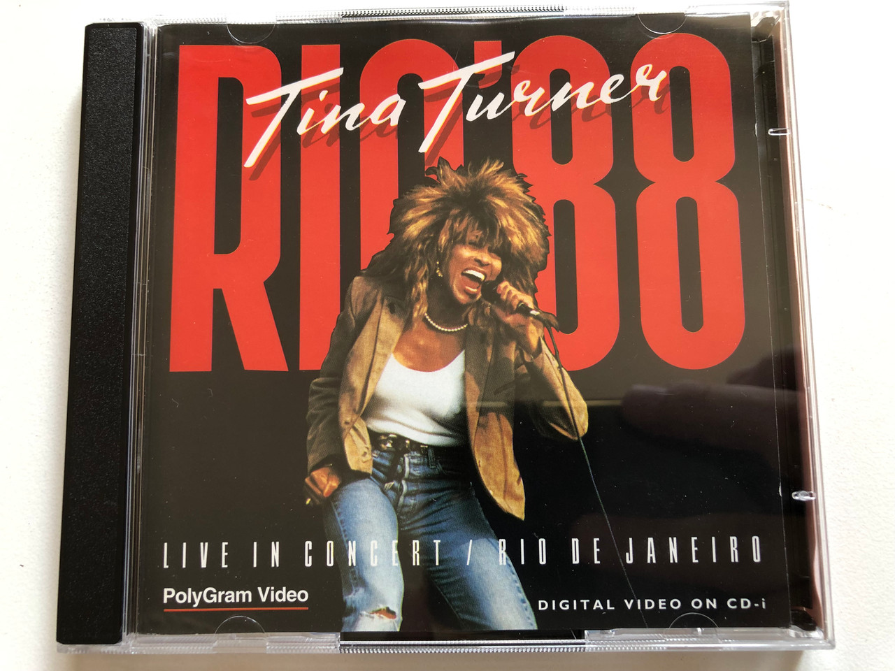 https://cdn10.bigcommerce.com/s-62bdpkt7pb/products/0/images/297173/Tina_Turner_Rio88_Live_In_Concert_Rio_De_Janeiro_Polygram_Video_2x_Audio_CD_PAL_1988_083_340-4_1__64371.1693329643.1280.1280.JPG?c=2&_gl=1*iz78au*_ga*MjA2NTIxMjE2MC4xNTkwNTEyNTMy*_ga_WS2VZYPC6G*MTY5MzMyNjE1MC4xMDUwLjEuMTY5MzMyOTUxMi4xMi4wLjA.