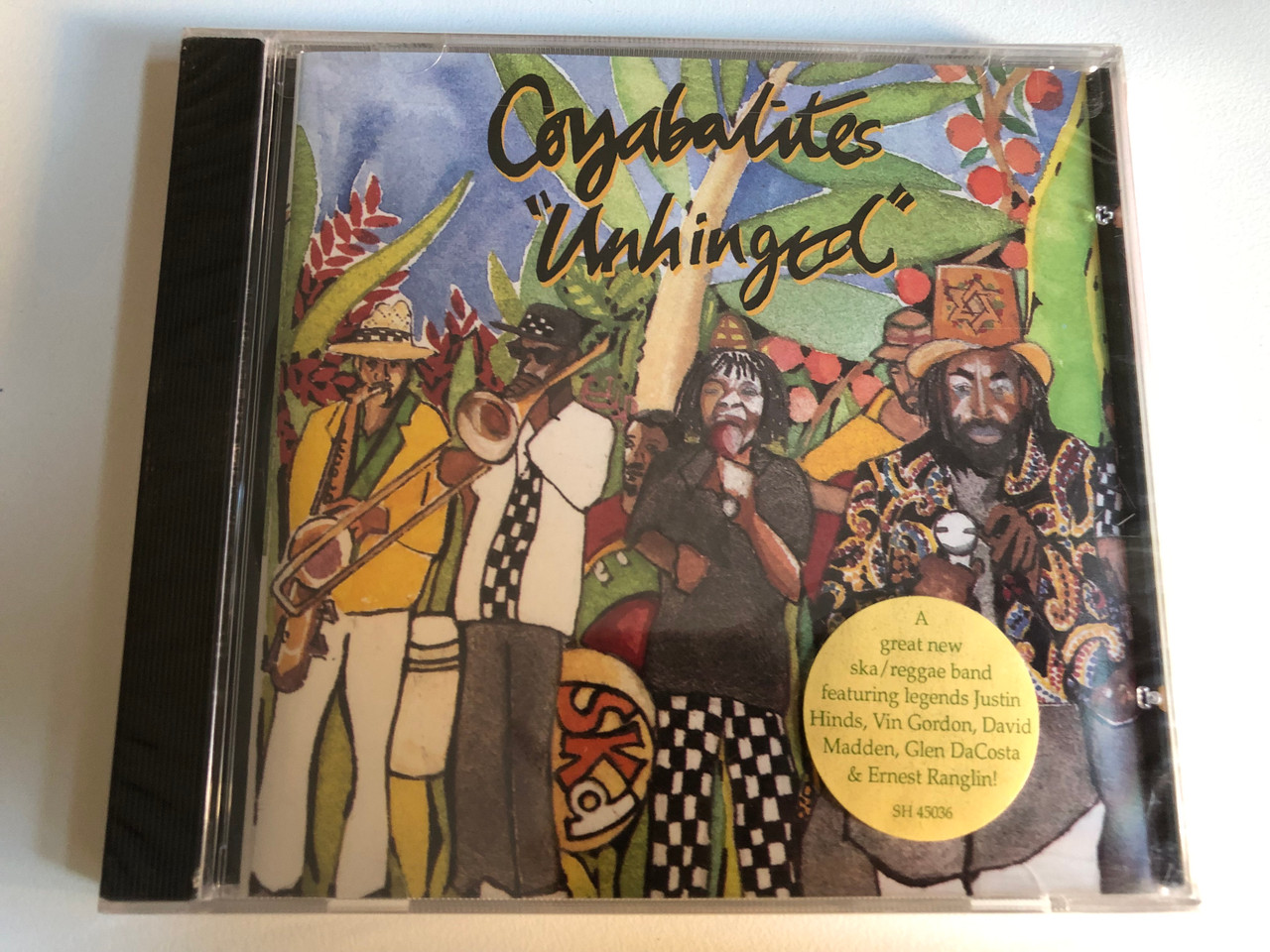 https://cdn10.bigcommerce.com/s-62bdpkt7pb/products/0/images/297671/Coyabalites_Unhinged_A_great_new_skareggae_band_featuring_legends_Justin_Hinds_Vin_Gordon_David_Madden_Glen_DaCosta_Ernest_Ranglin_Shanachie_Audio_CD_1997_45036_1__84320.1693502497.1280.1280.JPG?c=2&_gl=1*od7b5p*_ga*MjA2NTIxMjE2MC4xNTkwNTEyNTMy*_ga_WS2VZYPC6G*MTY5MzQ5ODY0MC4xMDU0LjEuMTY5MzUwMjQ5NC42MC4wLjA.