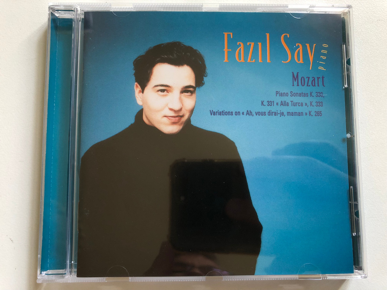 https://cdn10.bigcommerce.com/s-62bdpkt7pb/products/0/images/297759/Fazl_Say_piano_-_Mozart_Piano_Sonatas_K.330_K.331_Alla_Turca_K.333_Variations_On_Ah_Vous_Dirai-je_Maman_K.265_Warner_Music_France_Audio_CD_1997_WE885_1__19234.1693510619.1280.1280.JPG?c=2&_gl=1*h2elkc*_ga*MjA2NTIxMjE2MC4xNTkwNTEyNTMy*_ga_WS2VZYPC6G*MTY5MzQ5ODY0MC4xMDU0LjEuMTY5MzUxMDQzMy42MC4wLjA.