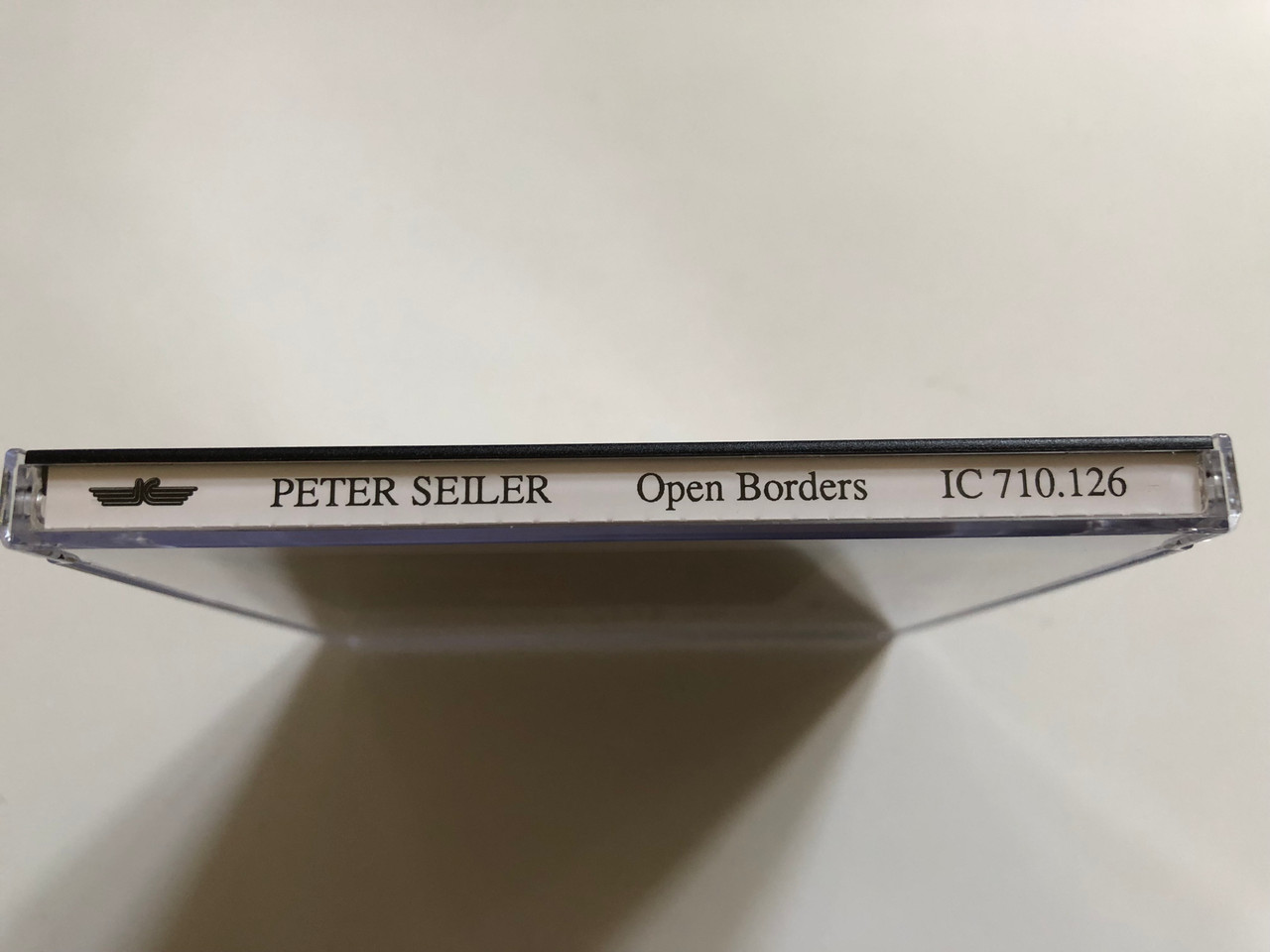 https://cdn10.bigcommerce.com/s-62bdpkt7pb/products/0/images/297779/Peter_Seiler_Open_Borders_Innovative_Communication_Audio_CD_1991_IC_710_3__53323.1693514148.1280.1280.JPG?c=2&_gl=1*jp06sw*_ga*MjA2NTIxMjE2MC4xNTkwNTEyNTMy*_ga_WS2VZYPC6G*MTY5MzQ5ODY0MC4xMDU0LjEuMTY5MzUxNDA1MC41OS4wLjA.