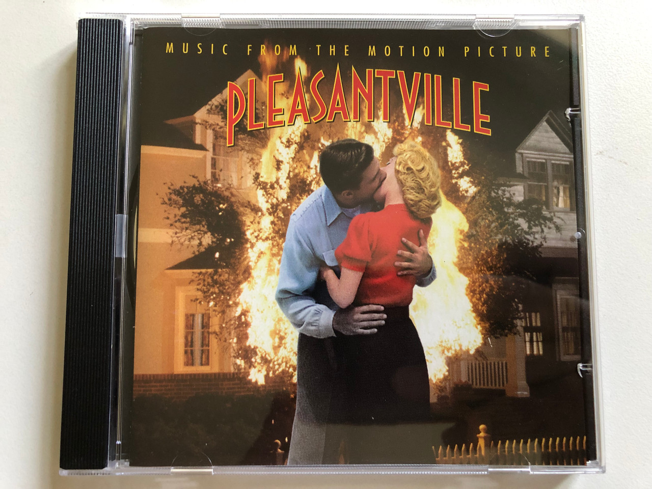 https://cdn10.bigcommerce.com/s-62bdpkt7pb/products/0/images/298063/Pleasantville_Music_From_The_Motion_Picture_Clean_Slate_Audio_CD_1998_492594_2_1__16499.1693587214.1280.1280.JPG?c=2&_gl=1*tst95o*_ga*MjA2NTIxMjE2MC4xNTkwNTEyNTMy*_ga_WS2VZYPC6G*MTY5MzU3NDQzOC4xMDU1LjEuMTY5MzU4NzEwMy4yLjAuMA..