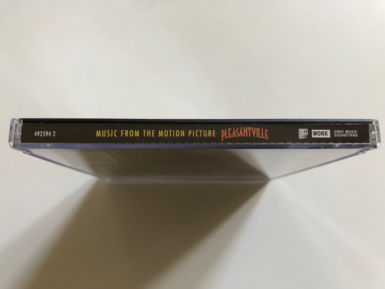 https://cdn10.bigcommerce.com/s-62bdpkt7pb/products/0/images/298065/Pleasantville_Music_From_The_Motion_Picture_Clean_Slate_Audio_CD_1998_492594_2_3__67824.1693587232.1280.1280.JPG?c=2&_gl=1*tst95o*_ga*MjA2NTIxMjE2MC4xNTkwNTEyNTMy*_ga_WS2VZYPC6G*MTY5MzU3NDQzOC4xMDU1LjEuMTY5MzU4NzEwMy4yLjAuMA..