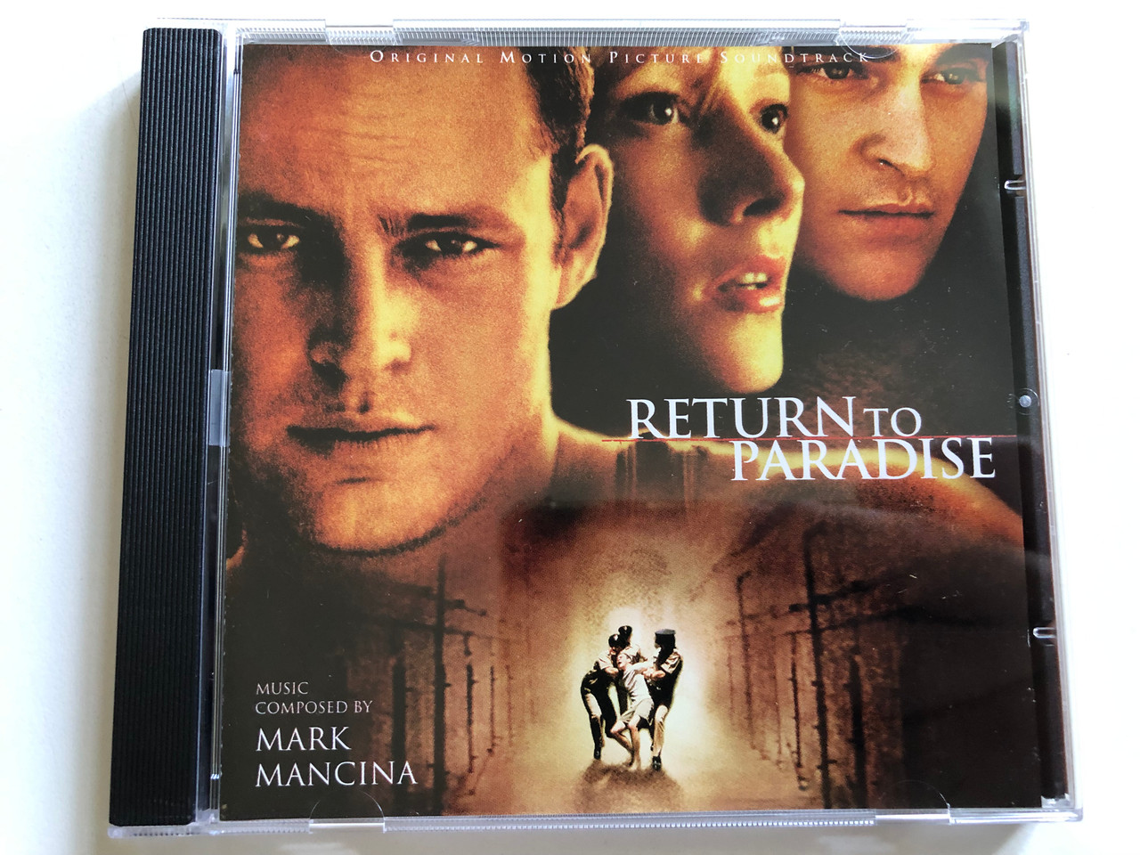 https://cdn10.bigcommerce.com/s-62bdpkt7pb/products/0/images/298380/Return_To_Paradise_Original_Motion_Picture_Soundtrack_-_Music_Composed_By_Mark_Mancina_Varse_Sarabande_Audio_CD_1998_VSD-5964_1__37956.1693810491.1280.1280.JPG?c=2&_gl=1*bux9md*_ga*MjA2NTIxMjE2MC4xNTkwNTEyNTMy*_ga_WS2VZYPC6G*MTY5MzgwNzIzNy4xMDU2LjEuMTY5MzgxMDM2OS4yMS4wLjA.