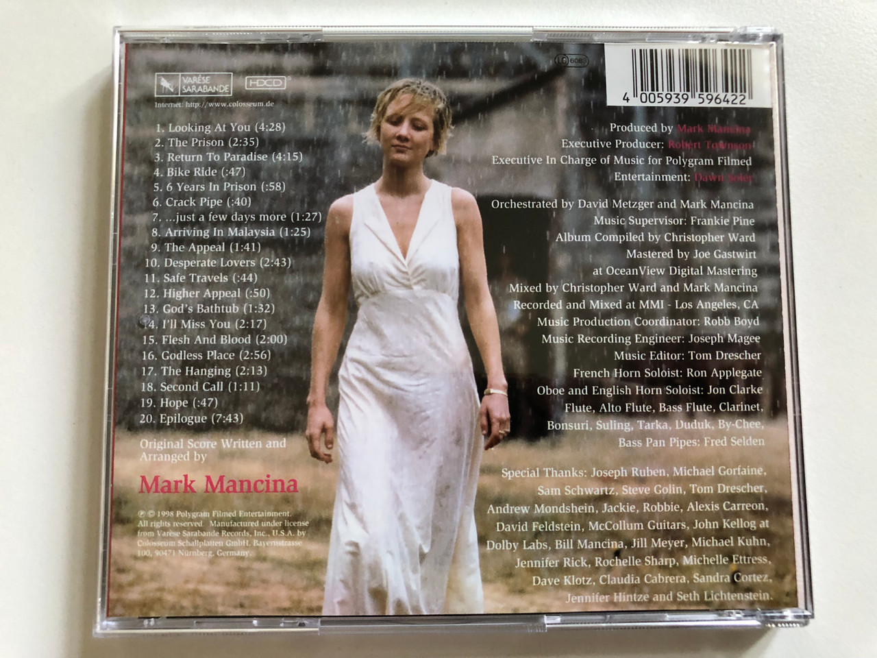 https://cdn10.bigcommerce.com/s-62bdpkt7pb/products/0/images/298381/Return_To_Paradise_Original_Motion_Picture_Soundtrack_-_Music_Composed_By_Mark_Mancina_Varse_Sarabande_Audio_CD_1998_VSD-5964_2__08369.1693810502.1280.1280.JPG?c=2&_gl=1*bux9md*_ga*MjA2NTIxMjE2MC4xNTkwNTEyNTMy*_ga_WS2VZYPC6G*MTY5MzgwNzIzNy4xMDU2LjEuMTY5MzgxMDM2OS4yMS4wLjA.