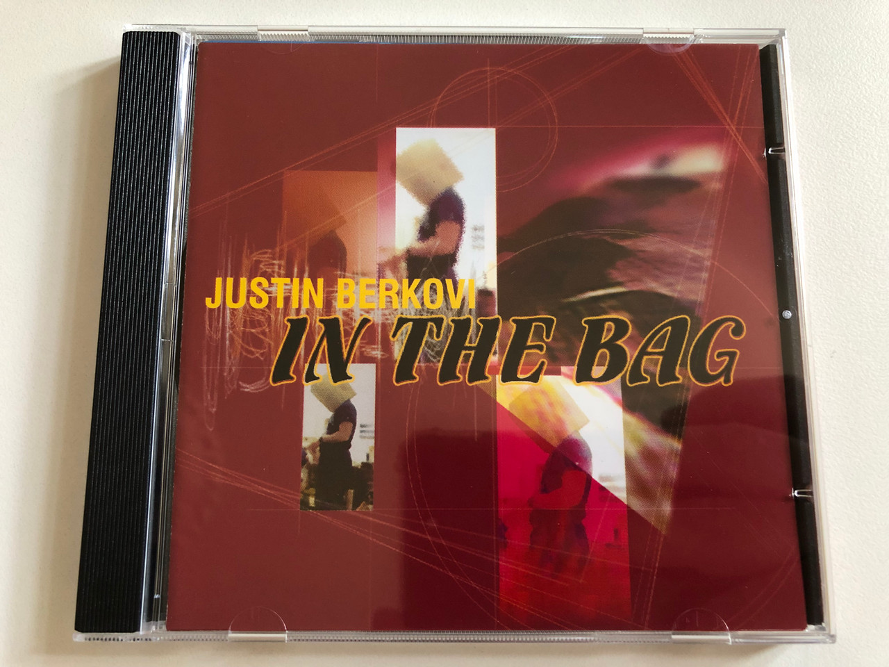 https://cdn10.bigcommerce.com/s-62bdpkt7pb/products/0/images/298712/Justin_Berkovi_In_The_Bag_Harthouse_Audio_CD_1999_HHCD02-2_1__73352.1693899807.1280.1280.JPG?c=2&_gl=1*o9rp6s*_ga*MjA2NTIxMjE2MC4xNTkwNTEyNTMy*_ga_WS2VZYPC6G*MTY5Mzg5NzkwOS4xMDU5LjEuMTY5Mzg5OTYzMi4yOS4wLjA.