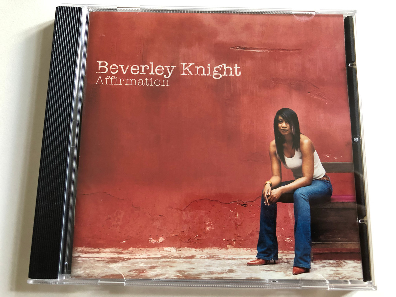 https://cdn10.bigcommerce.com/s-62bdpkt7pb/products/0/images/299043/Beverley_Knight_Affirmation_Parlophone_Audio_CD_2004_724386615428_1__71176.1693991391.1280.1280.JPG?c=2&_gl=1*adhnsd*_ga*MjA2NTIxMjE2MC4xNTkwNTEyNTMy*_ga_WS2VZYPC6G*MTY5Mzk3NjAyOS4xMDYwLjEuMTY5Mzk5MTM2NC4xMy4wLjA.