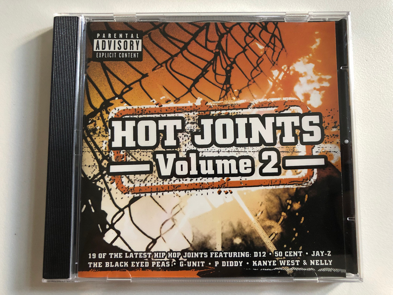 https://cdn10.bigcommerce.com/s-62bdpkt7pb/products/0/images/299154/Hot_Joints_Volume_2_-_19_Of_The_Latest_Hip_Hop_Joints_Featuring_D12_50_Cent_Jaz-Z_The_Black_Eyed_Peas_G-Unit_P_Diddy_Kanye_West_Nelly_Universal_Audio_CD_2004_06024_982_376-8_7__98924.1694068249.1280.1280.JPG?c=2&_gl=1*1nyg25e*_ga*MjA2NTIxMjE2MC4xNTkwNTEyNTMy*_ga_WS2VZYPC6G*MTY5NDA2MzU2NS4xMDYxLjEuMTY5NDA2Nzk3Ni43LjAuMA..