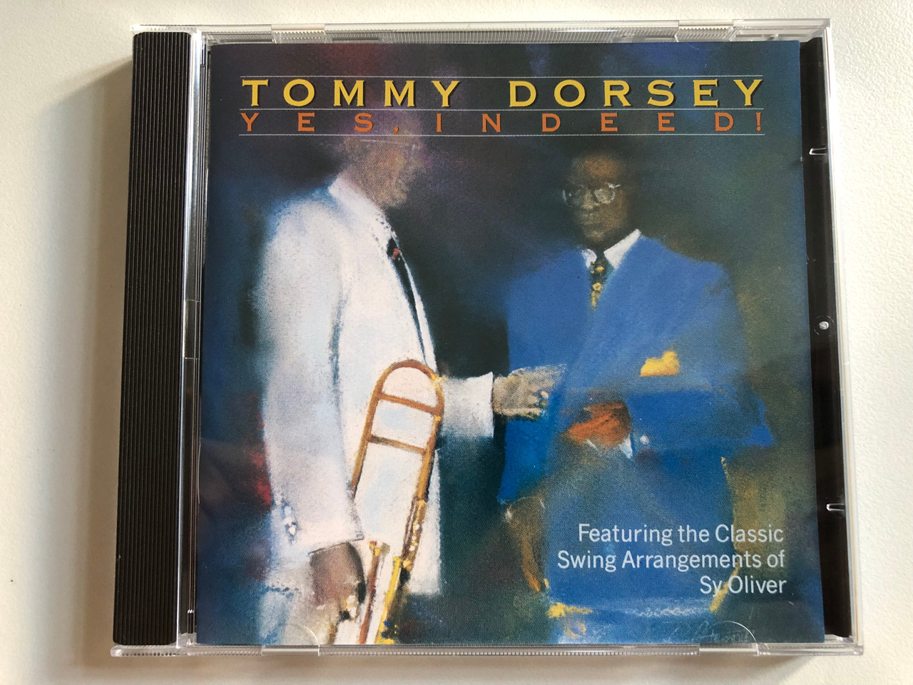 https://cdn10.bigcommerce.com/s-62bdpkt7pb/products/0/images/299208/Tommy_Dorsey_Yes_Indeed_-_Featuring_the_Classic_Swing_Arrangements_of_Sv._Oliver_Bluebird_Audio_CD_1990_ND90449_1__77816.1694083080.1280.1280.JPG?c=2&_gl=1*1dakey8*_ga*MjA2NTIxMjE2MC4xNTkwNTEyNTMy*_ga_WS2VZYPC6G*MTY5NDA4MTQ3MC4xMDYyLjEuMTY5NDA4Mjc0OC4zMy4wLjA.
