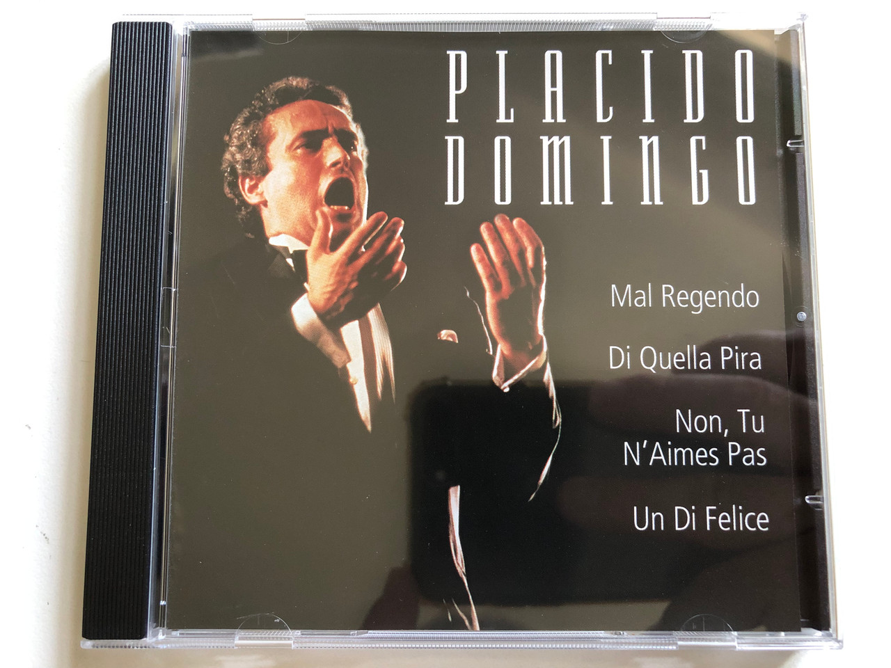 https://cdn10.bigcommerce.com/s-62bdpkt7pb/products/0/images/299256/Placido_Domingo_-_Mal_Regendo_Di_Quella_Pira_Non_Tu_NAimes_Pas_Un_Di_Felice_Weton-Wesgram_Audio_CD_2001_FG069_1__08289.1694151377.1280.1280.JPG?c=2&_gl=1*140z0ig*_ga*MjA2NTIxMjE2MC4xNTkwNTEyNTMy*_ga_WS2VZYPC6G*MTY5NDE0NDQwMy4xMDYzLjEuMTY5NDE1MTM1My42MC4wLjA.