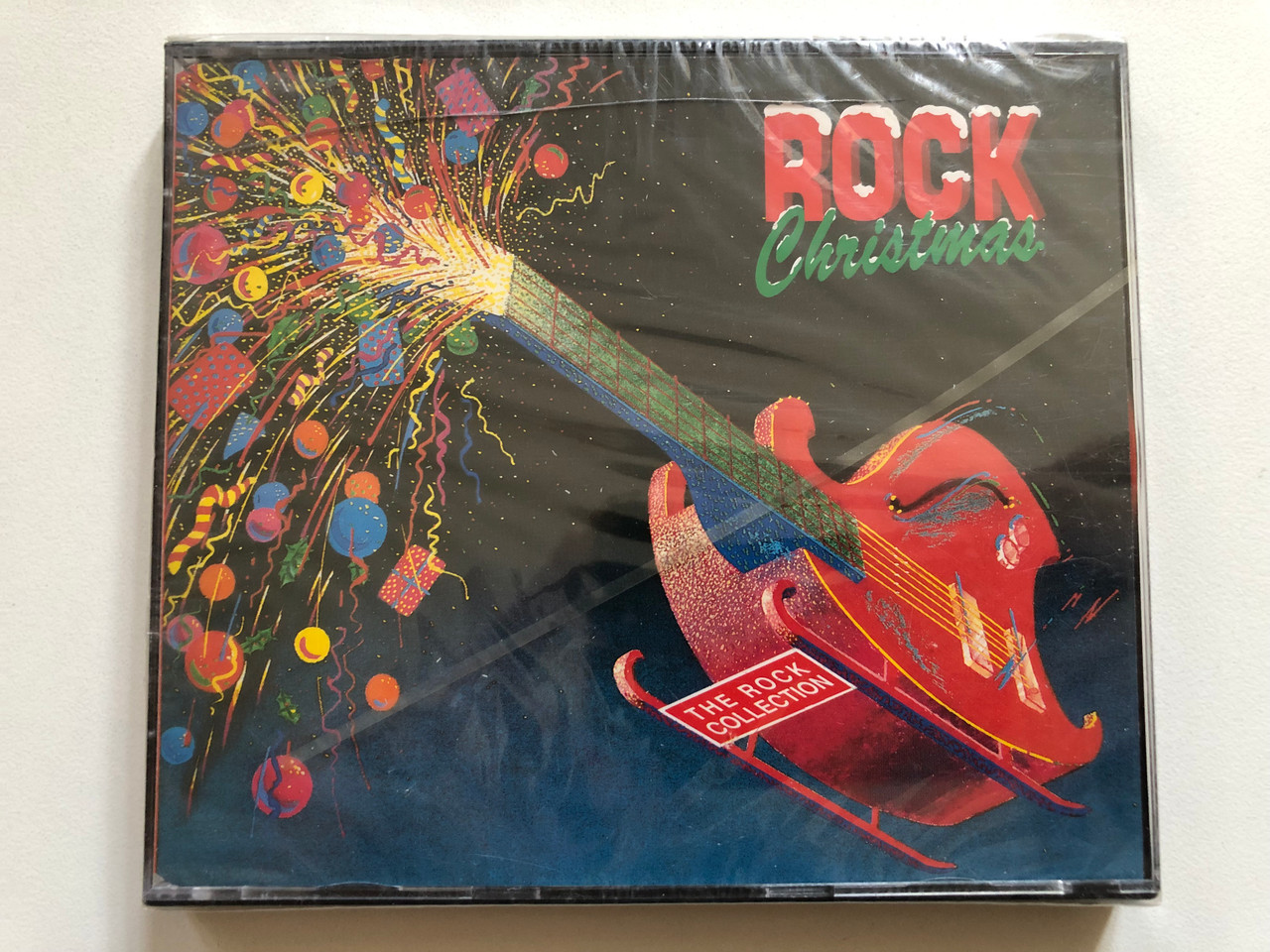 https://cdn10.bigcommerce.com/s-62bdpkt7pb/products/0/images/300858/Rock_Christmas_-_The_Rock_Collection_Time_Life_Music_2x_Audio_CD_1992_TL_52721_1__10884.1694534021.1280.1280.JPG?c=2&_gl=1*1wdcmqi*_ga*MjA2NTIxMjE2MC4xNTkwNTEyNTMy*_ga_WS2VZYPC6G*MTY5NDUzMzc3OS4xMDY3LjEuMTY5NDUzMzkwMC4xNi4wLjA.