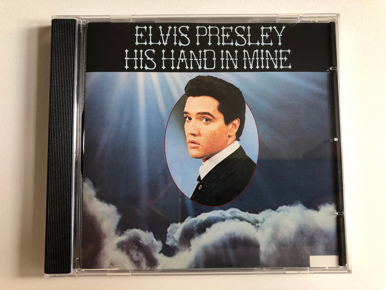 https://cdn10.bigcommerce.com/s-62bdpkt7pb/products/0/images/300880/Elvis_Presley_His_Hand_In_Mine_RCA_Audio_CD_1988_1319-2-R_1__10771.1694537085.1280.1280.JPG?c=2&_gl=1*1y66zpx*_ga*MjA2NTIxMjE2MC4xNTkwNTEyNTMy*_ga_WS2VZYPC6G*MTY5NDUzMzc3OS4xMDY3LjEuMTY5NDUzNjkwNy41OS4wLjA.