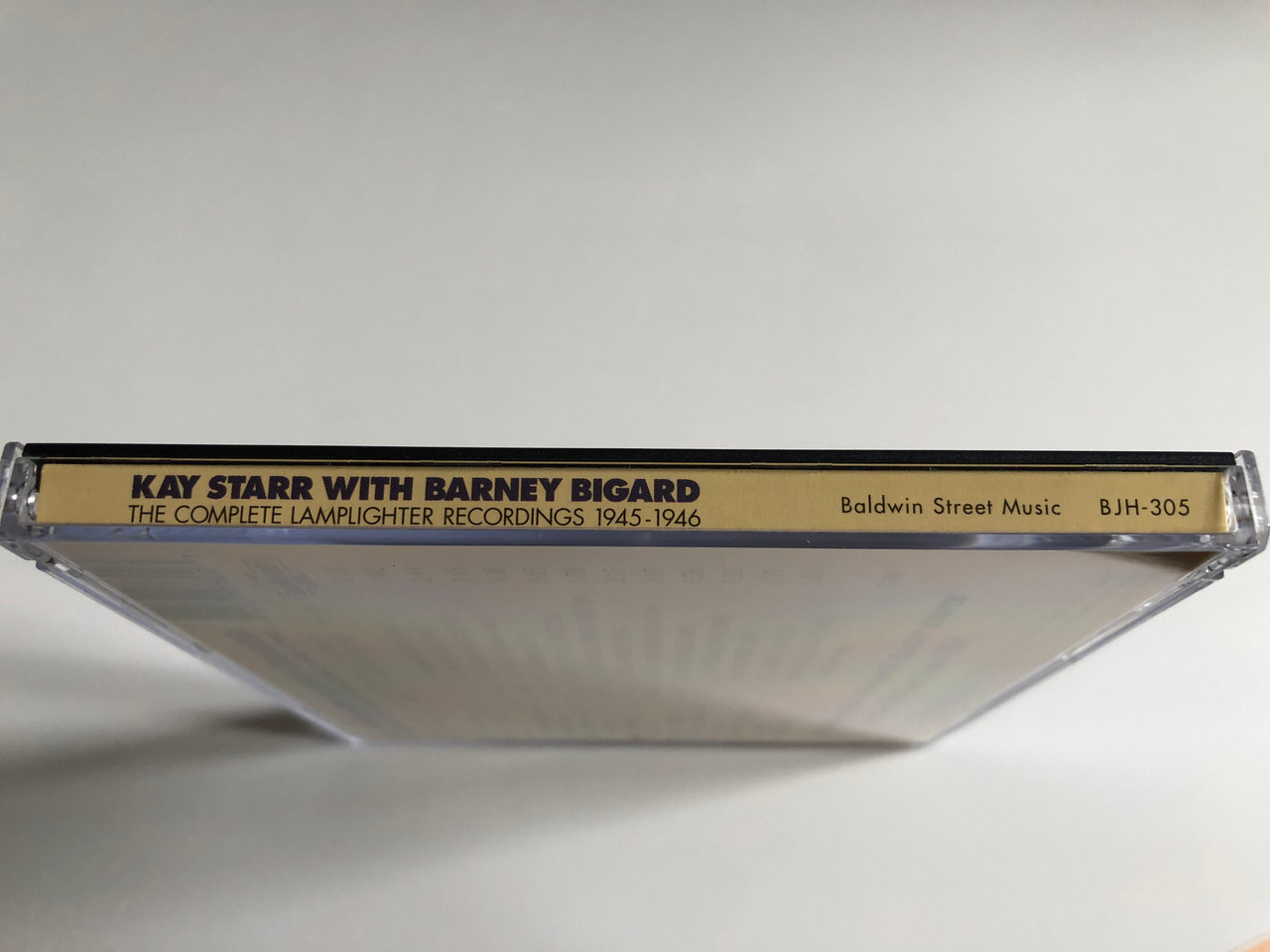 https://cdn10.bigcommerce.com/s-62bdpkt7pb/products/0/images/300906/Kay_Starr_The_Complete_Lamplighter_Recordings_1945_-_1946_-_with_Barney_Bigard_Baldwin_Street_Music_Audio_CD_1998_BJH-305_3__50635.1694541260.1280.1280.JPG?c=2&_gl=1*1g413ej*_ga*MjA2NTIxMjE2MC4xNTkwNTEyNTMy*_ga_WS2VZYPC6G*MTY5NDUzMzc3OS4xMDY3LjEuMTY5NDU0MTE1MS41OC4wLjA.