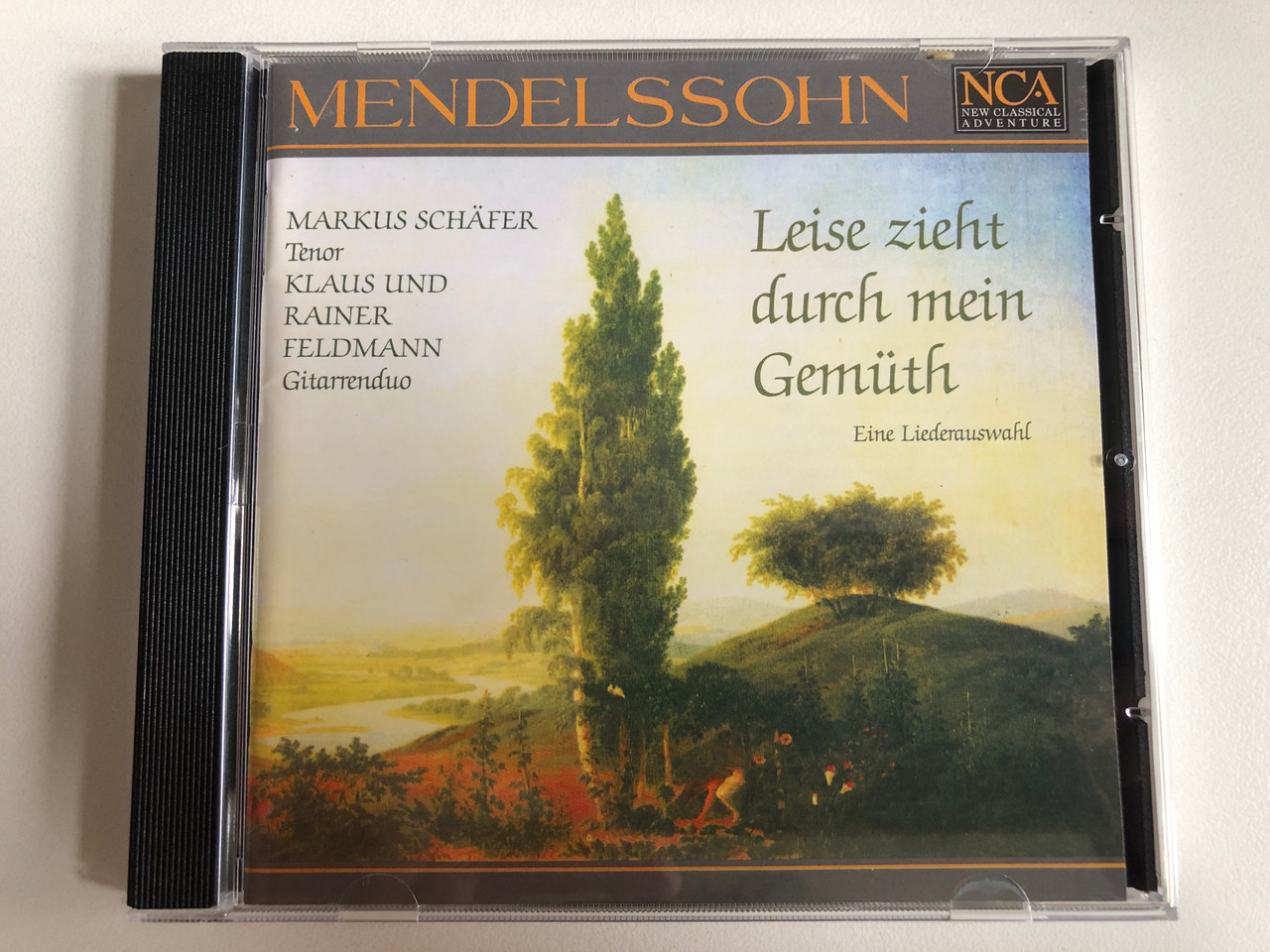 https://cdn10.bigcommerce.com/s-62bdpkt7pb/products/0/images/301017/Mendelssohn_Leise_Zieht_Durch_Mein_Gemth_Eine_Liederauswahl_-_Markus_Schfer_tenor_Klaus_Und_Rainer_Feldmann_Gitarrenduo_New_Classical_Adventure_Audio_CD_1995_MA_95_04_807_1__68185.1694593994.1280.1280.JPG?c=2&_gl=1*1sept5s*_ga*MjA2NTIxMjE2MC4xNTkwNTEyNTMy*_ga_WS2VZYPC6G*MTY5NDU4MjcxNC4xMDY4LjEuMTY5NDU5Mzg2MS42MC4wLjA.