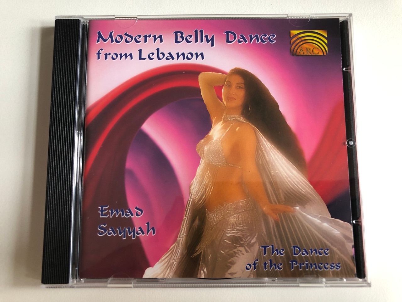 https://cdn10.bigcommerce.com/s-62bdpkt7pb/products/0/images/301634/Modern_Belly_Dance_Music_From_Lebanon_The_Dance_Of_The_Princess_-_Emad_Sayyah_ARC_Music_Audio_CD_1998_EUCD_1470_1__38367.1695724862.1280.1280.JPG?c=2&_gl=1*12pepoj*_ga*MjA2NTIxMjE2MC4xNTkwNTEyNTMy*_ga_WS2VZYPC6G*MTY5NTcyMjYwMy4xMDY5LjEuMTY5NTcyNDY2NS41MS4wLjA.