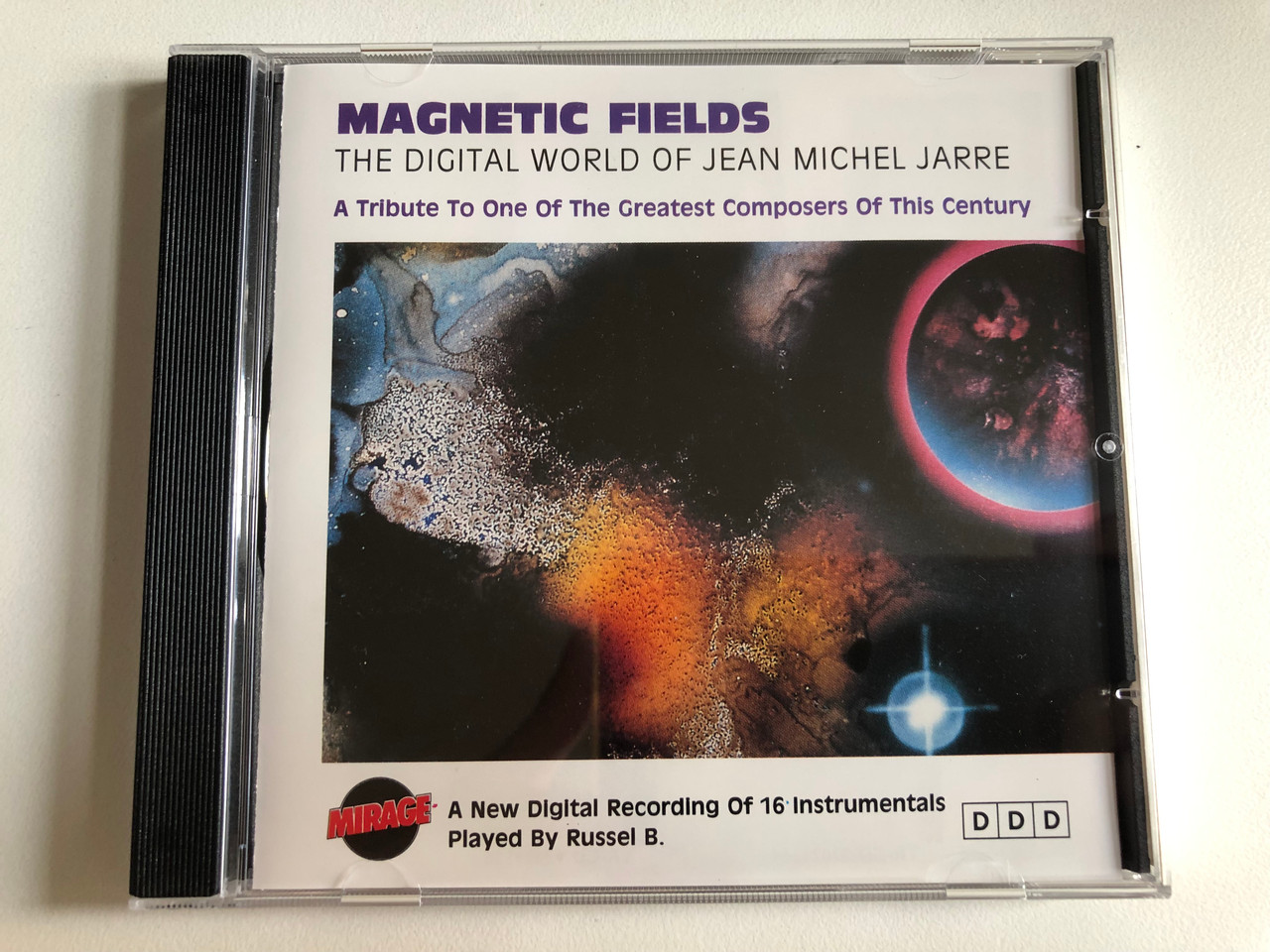 https://cdn10.bigcommerce.com/s-62bdpkt7pb/products/0/images/301671/Magnetic_Field_The_Digital_World_Of_Jean_Michel_Jarre_-_A_Tribute_To_One_Of_The_Greatest_Composers_Of_This_Century_A_New_Digital_Recording_Of_16_Instrumentals_Played_By_Russel_B._Mirage_A_1__89007.1695739313.1280.1280.JPG?c=2&_gl=1*1l20erm*_ga*MjA2NTIxMjE2MC4xNTkwNTEyNTMy*_ga_WS2VZYPC6G*MTY5NTczNDA1NC4xMDcwLjEuMTY5NTczOTExMi4yOC4wLjA.