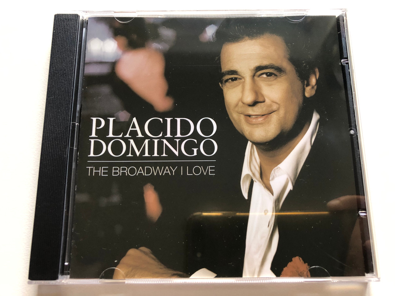 https://cdn10.bigcommerce.com/s-62bdpkt7pb/products/0/images/301718/Placido_Domingo_The_Broadway_I_Love_Edel_Records_Audio_CD_2007_0184342ERE_1__93668.1695803548.1280.1280.JPG?c=2&_gl=1*1b7qzic*_ga*MjA2NTIxMjE2MC4xNTkwNTEyNTMy*_ga_WS2VZYPC6G*MTY5NTgwMjg0MS4xMDczLjEuMTY5NTgwMzUwOC42MC4wLjA.