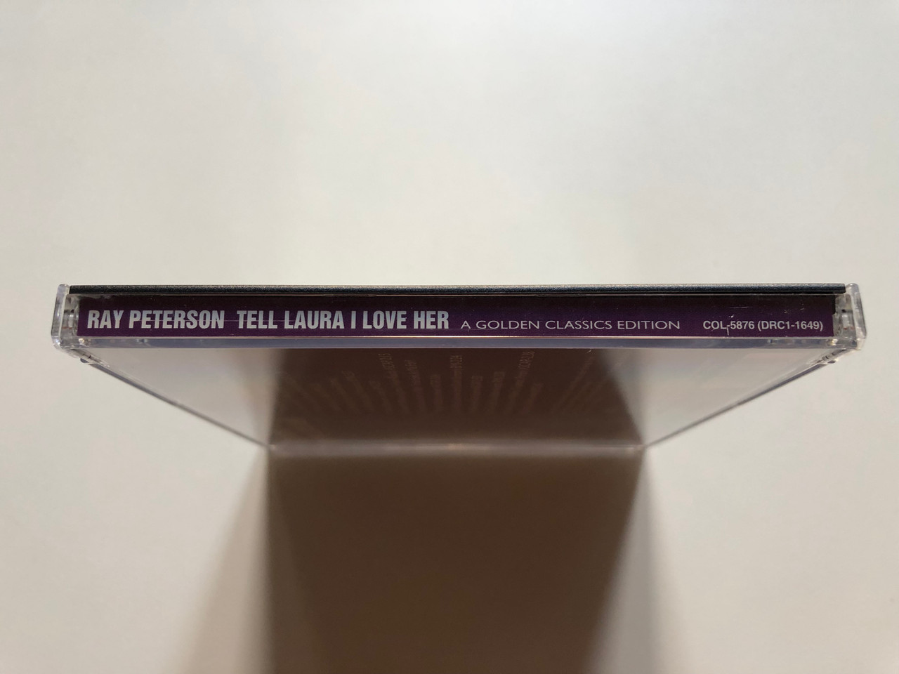 https://cdn10.bigcommerce.com/s-62bdpkt7pb/products/0/images/301769/Ray_Peterson_Sings_Tell_Laura_I_Love_Her_-_14_Great_Selections_Including_2_Bonus_Songs_Tell_Laura_I_Love_Her_The_Wonder_Of_You_Come_And_Get_It_Till_Then_Suddenly_Goodnight_My_Love_Fe_3__30173.1695820946.1280.1280.JPG?c=2&_gl=1*1x80d2n*_ga*MjA2NTIxMjE2MC4xNTkwNTEyNTMy*_ga_WS2VZYPC6G*MTY5NTgwMjg0MS4xMDczLjEuMTY5NTgwNDExOS41MC4wLjA.