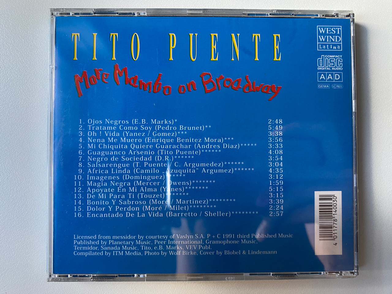 https://cdn10.bigcommerce.com/s-62bdpkt7pb/products/0/images/302082/Tito_Puente_More_Mambo_On_Broadway_West_Wind_Latina_Audio_CD_1991_ww_2203_2__90711.1695974753.1280.1280.jpg?c=2&_gl=1*1juqbqb*_ga*MjA2NTIxMjE2MC4xNTkwNTEyNTMy*_ga_WS2VZYPC6G*MTY5NTk2Nzc2My4xMDc2LjEuMTY5NTk3NDYwOS4xNC4wLjA.