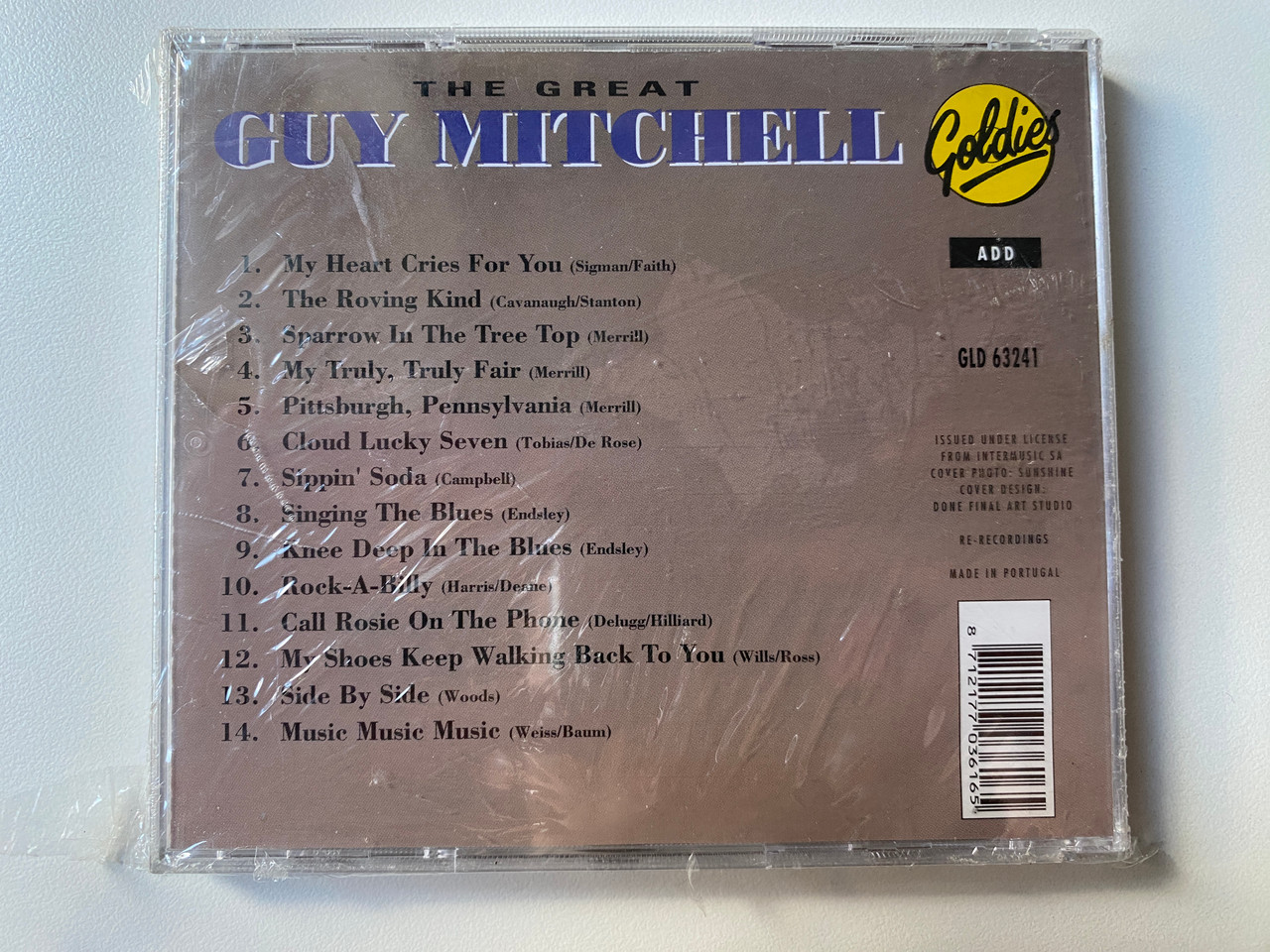 https://cdn10.bigcommerce.com/s-62bdpkt7pb/products/0/images/302102/The_Great_Guy_Mitchell_-_Singing_The_Blues_Rock_A-Billy_Knee_Deep_In_The_Blues_Cloud_Lucky_Seven_And_Many_Others_Goldies_Audio_CD_GLD_63241_2__32571.1695985815.1280.1280.jpg?c=2&_gl=1*1214u1h*_ga*MjA2NTIxMjE2MC4xNTkwNTEyNTMy*_ga_WS2VZYPC6G*MTY5NTk4NTEzMC4xMDc3LjEuMTY5NTk4NTY1Mi4yNC4wLjA.