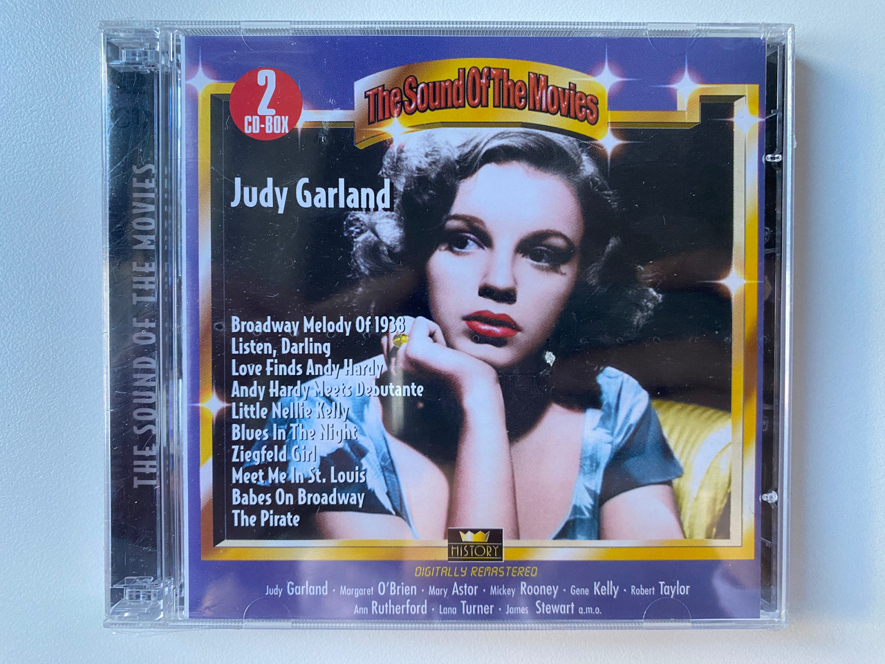 https://cdn10.bigcommerce.com/s-62bdpkt7pb/products/0/images/302106/The_Sound_Of_The_Movies_Judy_Garland_-_Broadway_Melody_Of_1938_Listen_Darling_Love_Finds_Andy_Hardy_Andy_Hardy_Meets_Deputante_Little_Nellie_Kelly_Blues_In_The_Night_Ziegfeld_Girl.._1__31263.1695989280.1280.1280.jpg?c=2&_gl=1*13p6txw*_ga*MjA2NTIxMjE2MC4xNTkwNTEyNTMy*_ga_WS2VZYPC6G*MTY5NTk4ODIxOS4xMDc4LjAuMTY5NTk4ODIxOS42MC4wLjA.