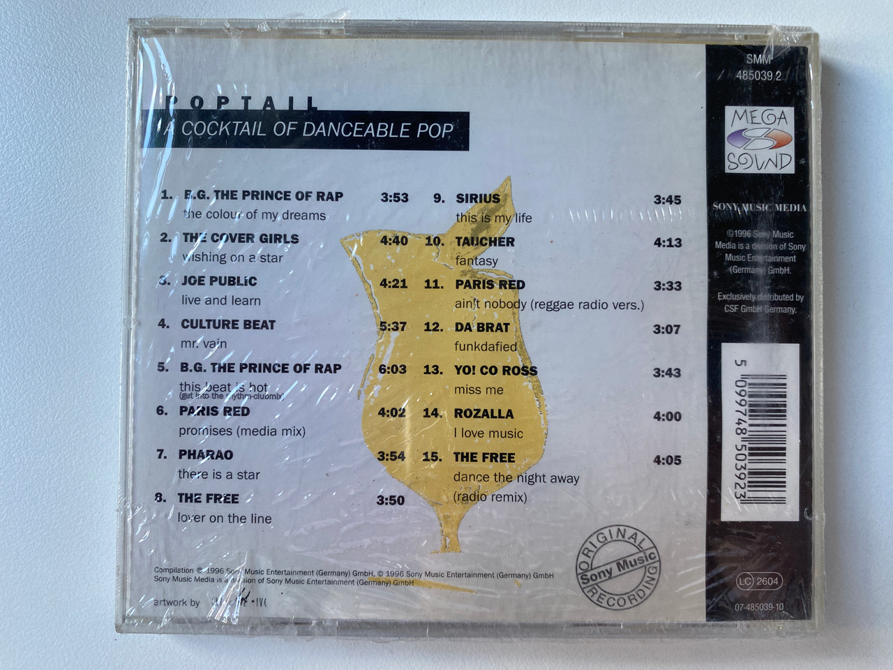 https://cdn10.bigcommerce.com/s-62bdpkt7pb/products/0/images/302126/Poptail_A_Cocktail_Of_Danceable_Pop_-_Paris_Red_Taucher_The_Cover_Girls_Yo_Co_Ross_Sony_Music_Media_Audio_CD_1996_485039_2_2__19696.1696225905.1280.1280.jpg?c=2&_gl=1*jzmk4h*_ga*MjA2NTIxMjE2MC4xNTkwNTEyNTMy*_ga_WS2VZYPC6G*MTY5NjIyNDYyMS4xMDc5LjEuMTY5NjIyNTc0Ni40MS4wLjA.