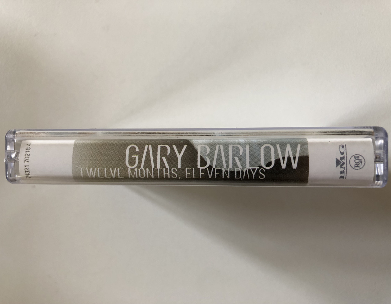 https://cdn10.bigcommerce.com/s-62bdpkt7pb/products/0/images/302212/Gary_Barlow_Twelve_Months_Eleven_Days_RCA_Audio_Cassette_1999_74321_70218_4_3__41339.1696237810.1280.1280.JPG?c=2&_gl=1*1onougw*_ga*MjA2NTIxMjE2MC4xNTkwNTEyNTMy*_ga_WS2VZYPC6G*MTY5NjIzNzY5MS4xMDgwLjAuMTY5NjIzNzcyMi4yOS4wLjA.