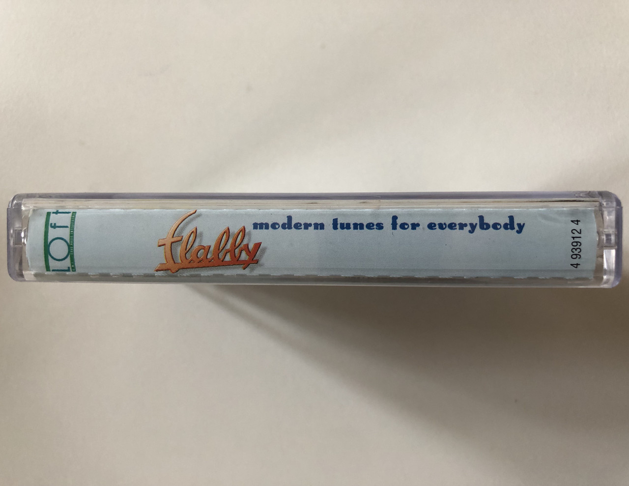 https://cdn10.bigcommerce.com/s-62bdpkt7pb/products/0/images/302218/Flabby_Modern_Tunes_For_Everybody_Loft_Audio_Cassette_1998_4_93912_4_3__18143.1696238190.1280.1280.JPG?c=2&_gl=1*kwatdj*_ga*MjA2NTIxMjE2MC4xNTkwNTEyNTMy*_ga_WS2VZYPC6G*MTY5NjIzNzY5MS4xMDgwLjEuMTY5NjIzODA5NS41MS4wLjA.