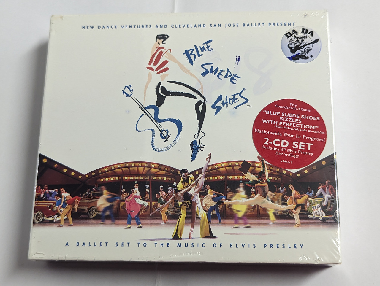https://cdn10.bigcommerce.com/s-62bdpkt7pb/products/0/images/302287/Blue_Suede_Shoes_-_A_Ballet_Set_To_The_Music_Of_Elvis_Presley_New_Dance_Ventures_And_Cleveland_San_Jose_Ballet_Present_2-CD_Set_Includes_37_Elvis_Presley_Recordings_BMG_2x_Audio_CD_1997_1__86327.1696327001.1280.1280.jpg?c=2&_gl=1*7eb3q0*_ga*MjA2NTIxMjE2MC4xNTkwNTEyNTMy*_ga_WS2VZYPC6G*MTY5NjMyNjUxMy4xMDgzLjEuMTY5NjMyNjY0Ni42MC4wLjA.