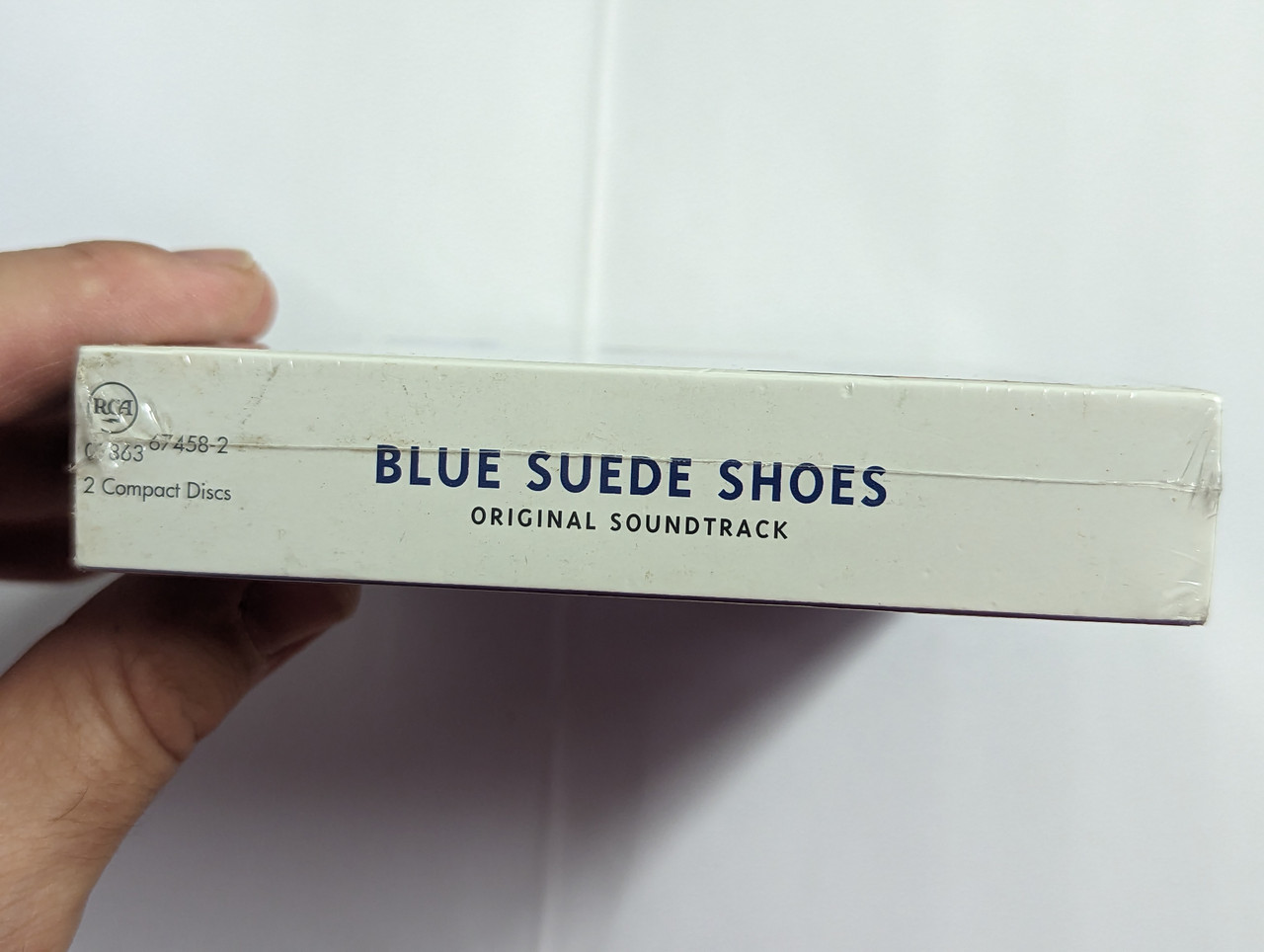 https://cdn10.bigcommerce.com/s-62bdpkt7pb/products/0/images/302288/Blue_Suede_Shoes_-_A_Ballet_Set_To_The_Music_Of_Elvis_Presley_New_Dance_Ventures_And_Cleveland_San_Jose_Ballet_Present_2-CD_Set_Includes_37_Elvis_Presley_Recordings_BMG_2x_Audio_CD_1997_3__55421.1696327009.1280.1280.jpg?c=2&_gl=1*7eb3q0*_ga*MjA2NTIxMjE2MC4xNTkwNTEyNTMy*_ga_WS2VZYPC6G*MTY5NjMyNjUxMy4xMDgzLjEuMTY5NjMyNjY0Ni42MC4wLjA.