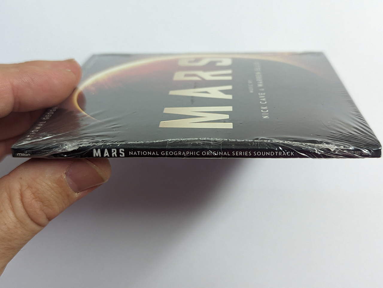 https://cdn10.bigcommerce.com/s-62bdpkt7pb/products/0/images/302437/Mars_-_Music_By_Nick_Cave_Warren_Ellis_National_Geographic_Original_Series_Soundtrack_Milan_Audio_CD_2017_M2-36817_3__98749.1696407057.1280.1280.jpg?c=2&_gl=1*17g9rp4*_ga*MjA2NTIxMjE2MC4xNTkwNTEyNTMy*_ga_WS2VZYPC6G*MTY5NjM5NjIwNS4xMDg0LjEuMTY5NjM5ODMxOC40Ny4wLjA.