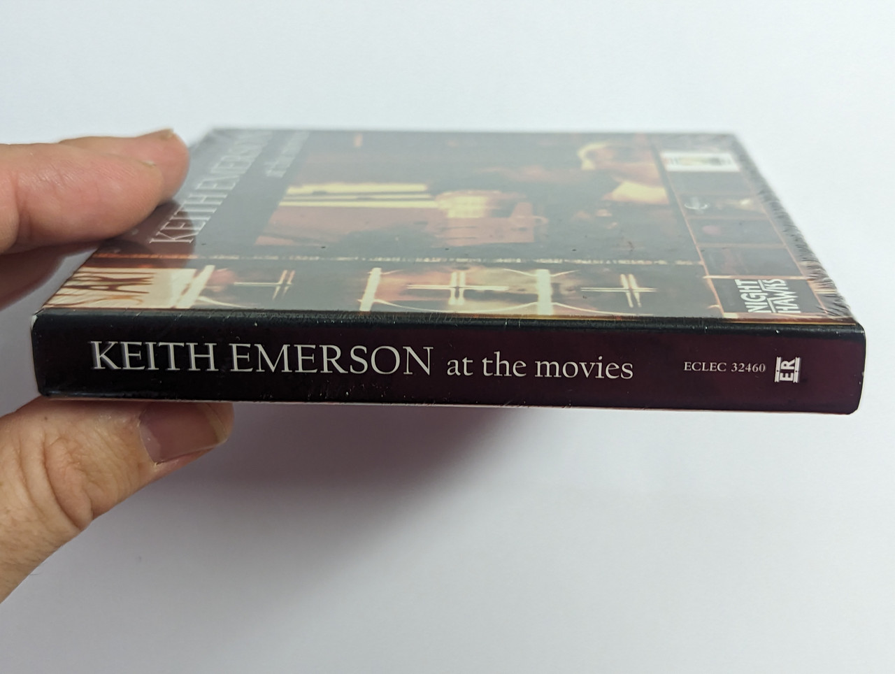 https://cdn10.bigcommerce.com/s-62bdpkt7pb/products/0/images/302449/Keith_Emerson_At_The_Movies_Esoteric_Recordings_3x_Audio_CD_2014_ECLEC_32460_3__56879.1696408996.1280.1280.jpg?c=2&_gl=1*mlsl7q*_ga*MjA2NTIxMjE2MC4xNTkwNTEyNTMy*_ga_WS2VZYPC6G*MTY5NjQwNzEwMS4xMDg1LjEuMTY5NjQwODc4MS40Ny4wLjA.