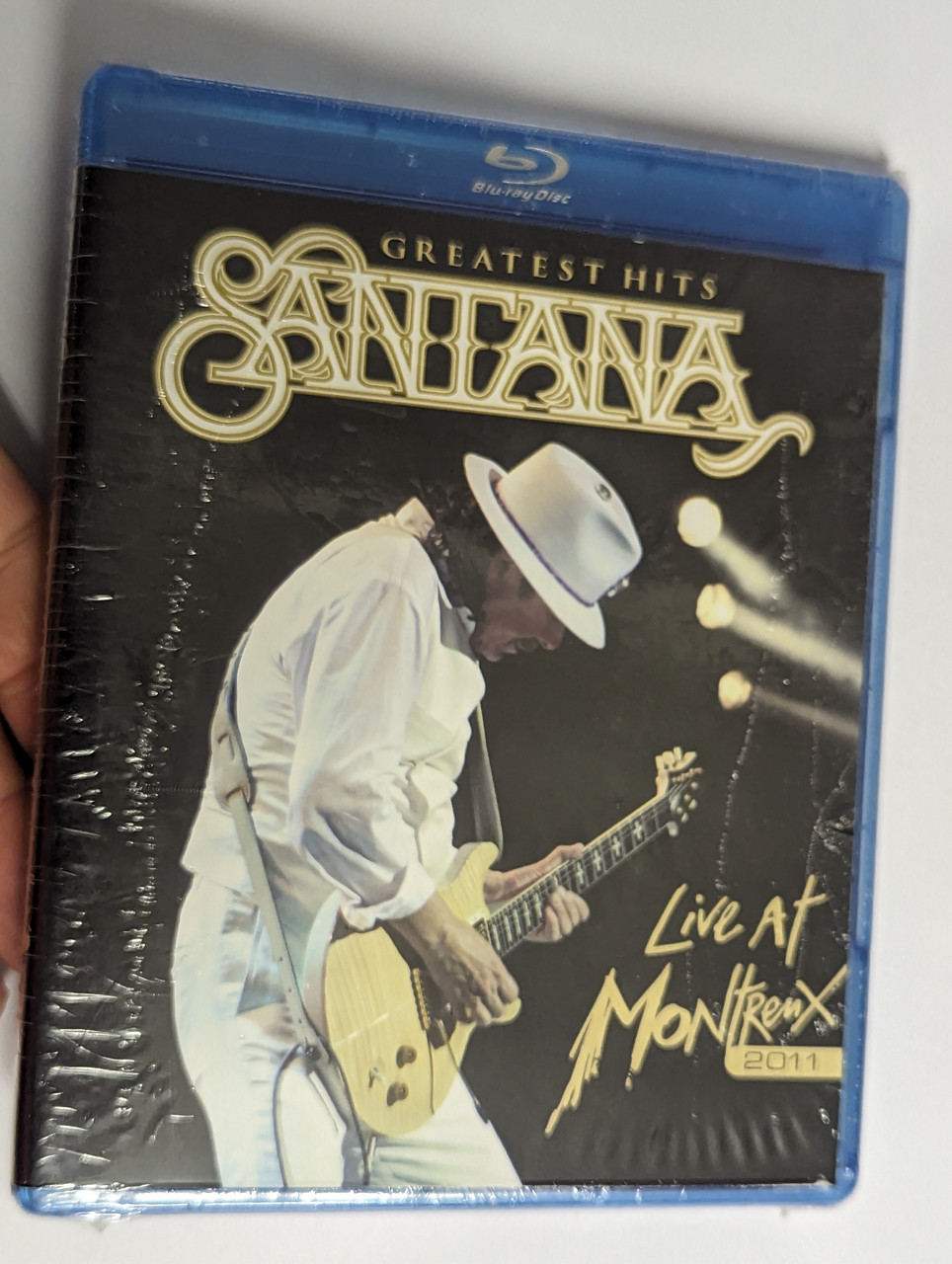 https://cdn10.bigcommerce.com/s-62bdpkt7pb/products/0/images/302450/Santana_Greatest_Hits_Live_At_Montreux_2011_Eagle_Eye_Media_Blue-Ray_2011_EEB334099_1__52474.1696409631.1280.1280.jpg?c=2&_gl=1*16ptel4*_ga*MjA2NTIxMjE2MC4xNTkwNTEyNTMy*_ga_WS2VZYPC6G*MTY5NjQwNzEwMS4xMDg1LjEuMTY5NjQwOTEzNy41OC4wLjA.