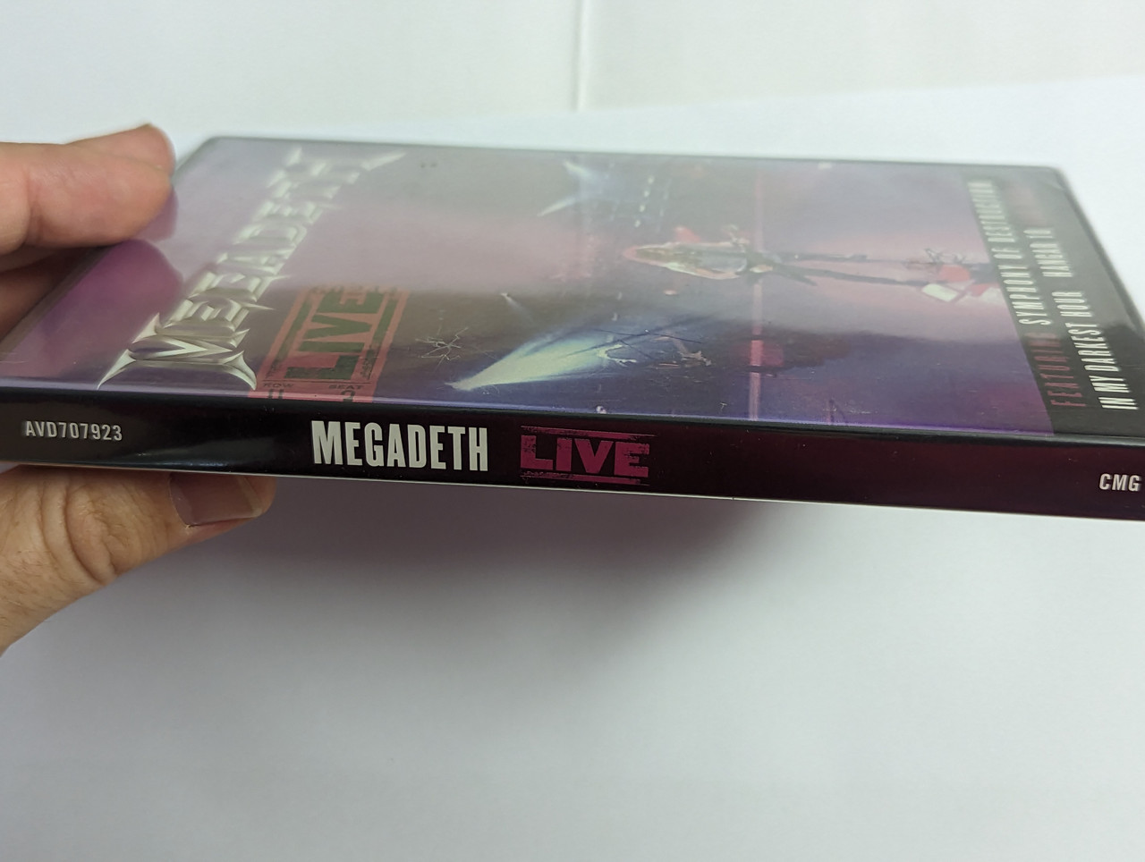 https://cdn10.bigcommerce.com/s-62bdpkt7pb/products/0/images/302467/Megadeth_Live_Featuring_Symphony_Of_Destruction_In_My_Darkest_Hour_Hangar_18_And_More_Sanctuary_DVD_Video_CD_2007_AVD707923_3__78350.1696411876.1280.1280.jpg?c=2&_gl=1*cc9ist*_ga*MjA2NTIxMjE2MC4xNTkwNTEyNTMy*_ga_WS2VZYPC6G*MTY5NjQwNzEwMS4xMDg1LjEuMTY5NjQxMTQ2NC40Mi4wLjA.