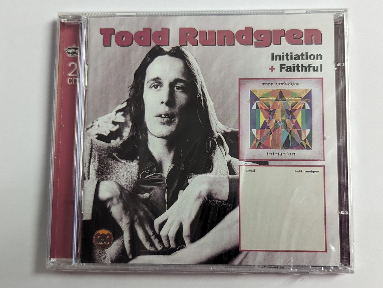 https://cdn10.bigcommerce.com/s-62bdpkt7pb/products/0/images/302495/Todd_Rundgren_Initiation_Faithful_Edsel_Records_2x_Audio_CD_2011_EDSD_2124_1__58487.1696419375.1280.1280.jpg?c=2&_gl=1*6ogqb2*_ga*MjA2NTIxMjE2MC4xNTkwNTEyNTMy*_ga_WS2VZYPC6G*MTY5NjQxODk3OS4xMDg2LjEuMTY5NjQxOTI1NS42MC4wLjA.