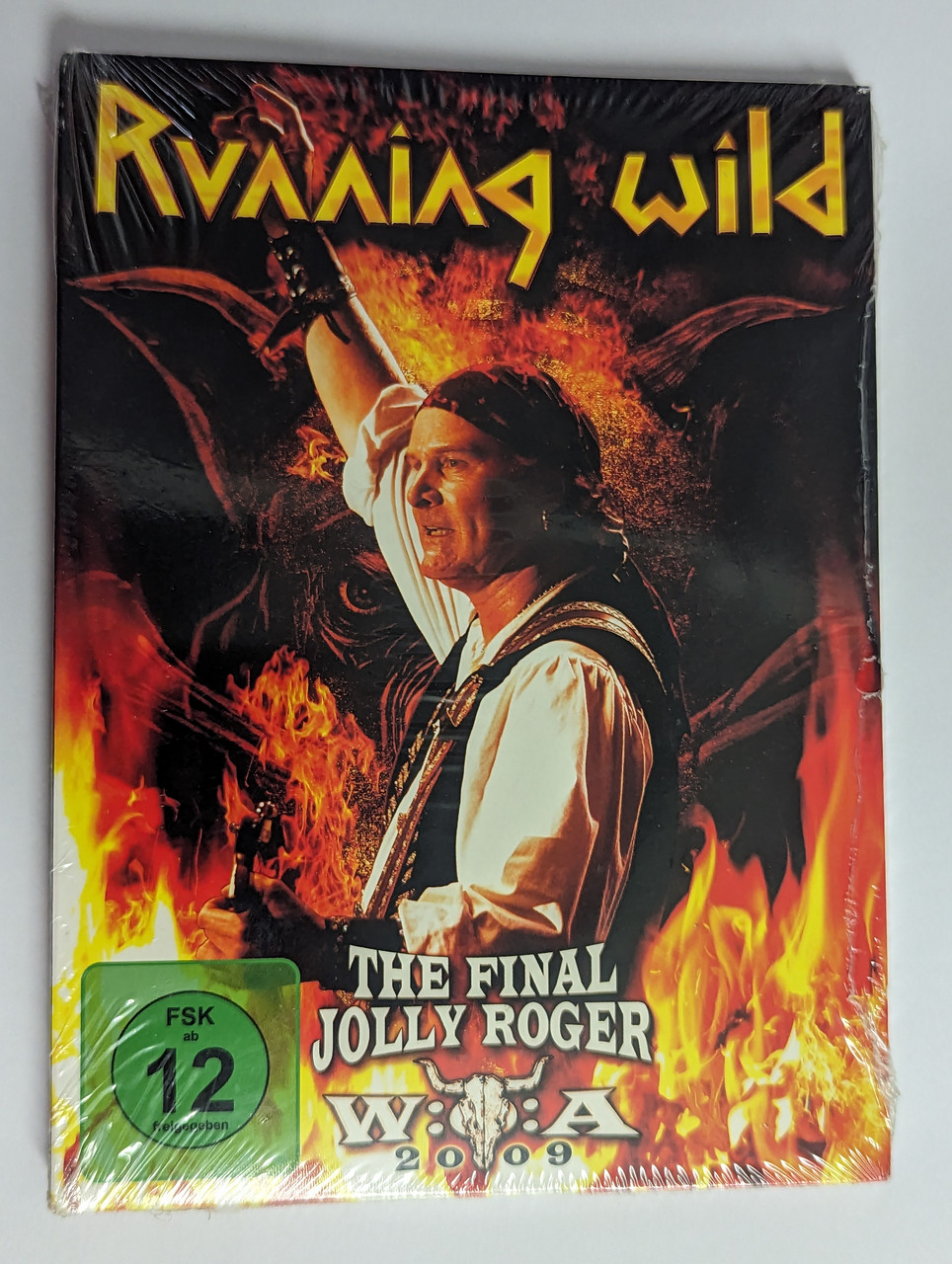 https://cdn10.bigcommerce.com/s-62bdpkt7pb/products/0/images/302508/Running_Wild_The_Final_Jolly_Roger_Wacken_2009_Golden_Core_DVD_Video_CD_GCRDVD_23_1__03937.1696421055.1280.1280.jpg?c=2&_gl=1*1tv810*_ga*MjA2NTIxMjE2MC4xNTkwNTEyNTMy*_ga_WS2VZYPC6G*MTY5NjQxODk3OS4xMDg2LjEuMTY5NjQyMDUxMS4yNy4wLjA.