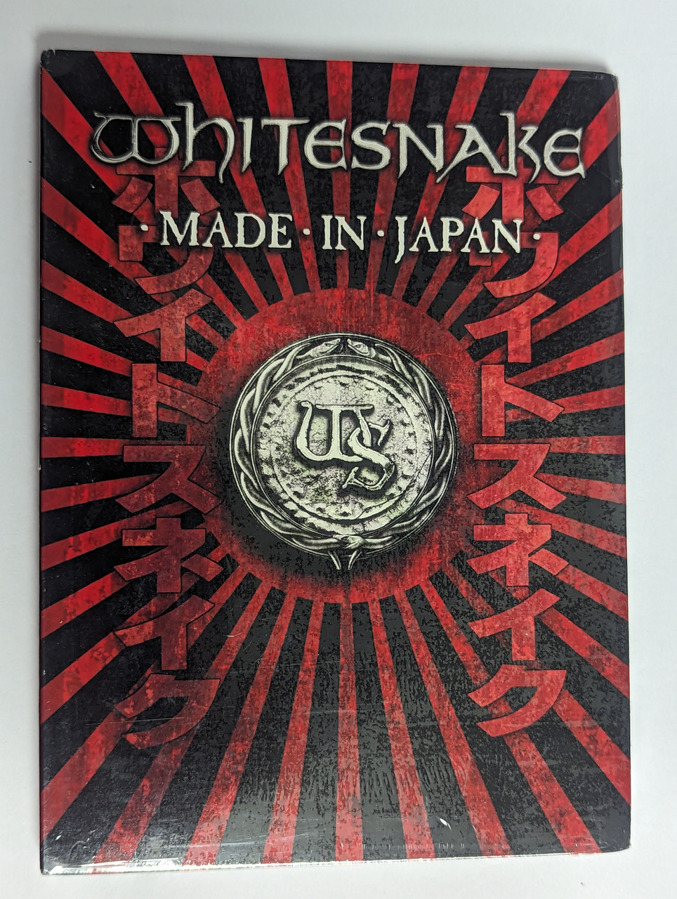 https://cdn10.bigcommerce.com/s-62bdpkt7pb/products/0/images/302527/Whitesnake_Made_In_Japan_Frontiers_Records_DVD_Video_2013_FR_DVD_033_1__55209.1696481981.1280.1280.jpg?c=2&_gl=1*1w14x6i*_ga*MjA2NTIxMjE2MC4xNTkwNTEyNTMy*_ga_WS2VZYPC6G*MTY5NjQ3NzU0OS4xMDg3LjEuMTY5NjQ4MTY3MS41OC4wLjA.