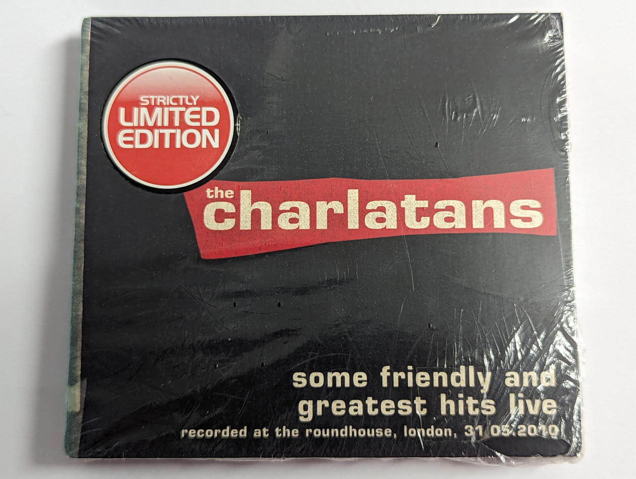 https://cdn10.bigcommerce.com/s-62bdpkt7pb/products/0/images/302542/The_Charlatans_Some_Friendly_And_Greatest_Hits_Live_Recorded_At_The_Roundhouse_London_31.05.2010_Strictly_Limited_Edition_Concert_Live_3x_Audio_CD_CLCD278_1__59376.1696495951.1280.1280.jpg?c=2&_gl=1*1jmre6j*_ga*MjA2NTIxMjE2MC4xNTkwNTEyNTMy*_ga_WS2VZYPC6G*MTY5NjQ5NDU2NS4xMDg4LjEuMTY5NjQ5NTczMC41Ni4wLjA.