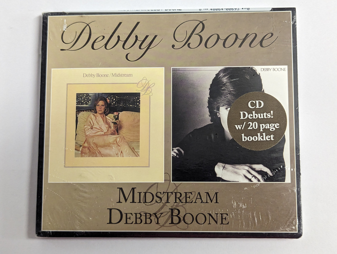 https://cdn10.bigcommerce.com/s-62bdpkt7pb/products/0/images/302548/Debby_Boone_Midstream_Debby_Boone_Real_Gone_Music_Audio_CD_2018_RGM-0693_1__83702.1696497889.1280.1280.jpg?c=2&_gl=1*1304b1v*_ga*MjA2NTIxMjE2MC4xNTkwNTEyNTMy*_ga_WS2VZYPC6G*MTY5NjQ5NDU2NS4xMDg4LjEuMTY5NjQ5NzQxNC4yMC4wLjA.