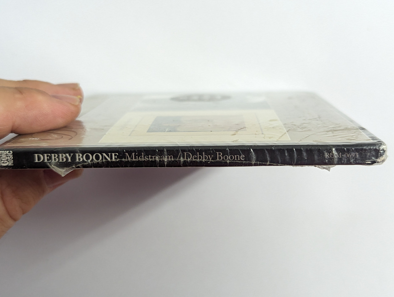 https://cdn10.bigcommerce.com/s-62bdpkt7pb/products/0/images/302550/Debby_Boone_Midstream_Debby_Boone_Real_Gone_Music_Audio_CD_2018_RGM-0693_3__25608.1696497903.1280.1280.jpg?c=2&_gl=1*1304b1v*_ga*MjA2NTIxMjE2MC4xNTkwNTEyNTMy*_ga_WS2VZYPC6G*MTY5NjQ5NDU2NS4xMDg4LjEuMTY5NjQ5NzQxNC4yMC4wLjA.