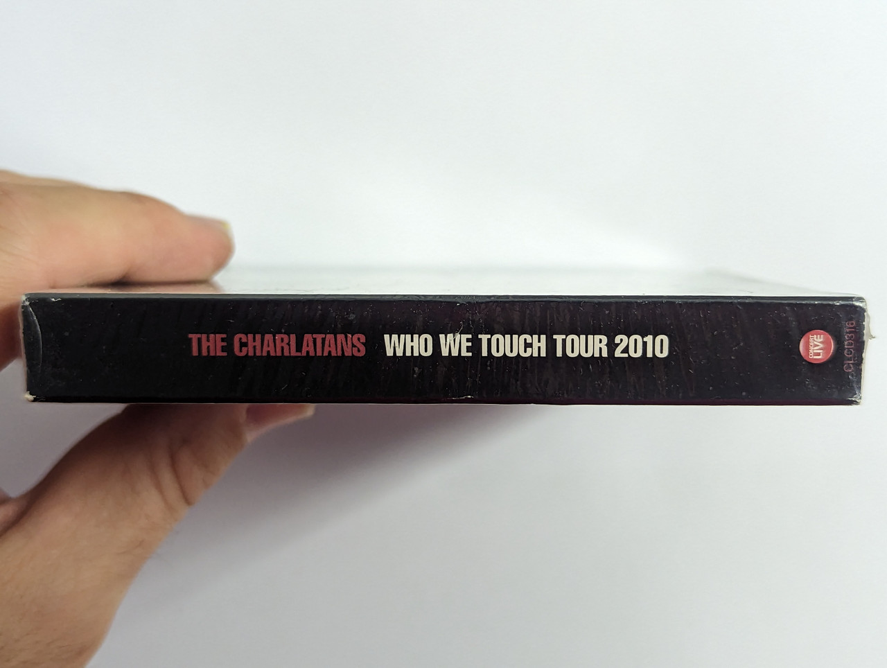 https://cdn10.bigcommerce.com/s-62bdpkt7pb/products/0/images/302571/The_Charlatans_Who_We_Touch_Tour_2010_Concert_Live_3x_Audio_CD_CLCD316_3__92415.1696502364.1280.1280.jpg?c=2&_gl=1*1hyfr7f*_ga*MjA2NTIxMjE2MC4xNTkwNTEyNTMy*_ga_WS2VZYPC6G*MTY5NjQ5NDU2NS4xMDg4LjEuMTY5NjUwMjIyMS4xMC4wLjA.
