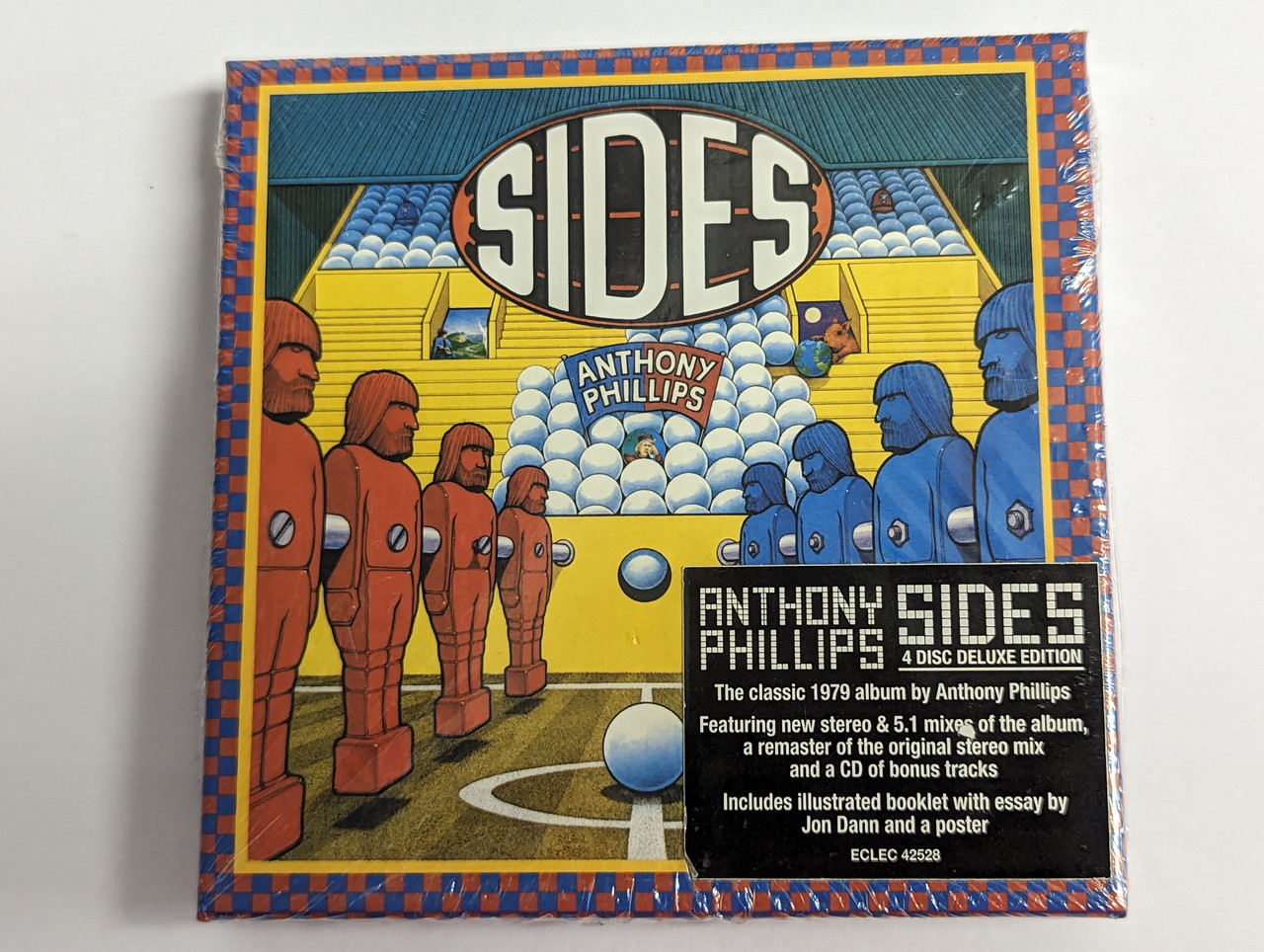 https://cdn10.bigcommerce.com/s-62bdpkt7pb/products/0/images/302580/Anthony_Phillips_Sides_4_Disc_Deluxe_Edition_The_classic_1979_album_by_Anthony_Philips_Featuring_new_stereo_5._1_mixes_of_the_album_a_remaster_of_the_original_stereo_mix_Esoteric_Re_1__86579.1696510889.1280.1280.jpg?c=2&_gl=1*1201att*_ga*MjA2NTIxMjE2MC4xNTkwNTEyNTMy*_ga_WS2VZYPC6G*MTY5NjUxMDI4Ny4xMDg5LjEuMTY5NjUxMDU2OC41MS4wLjA.
