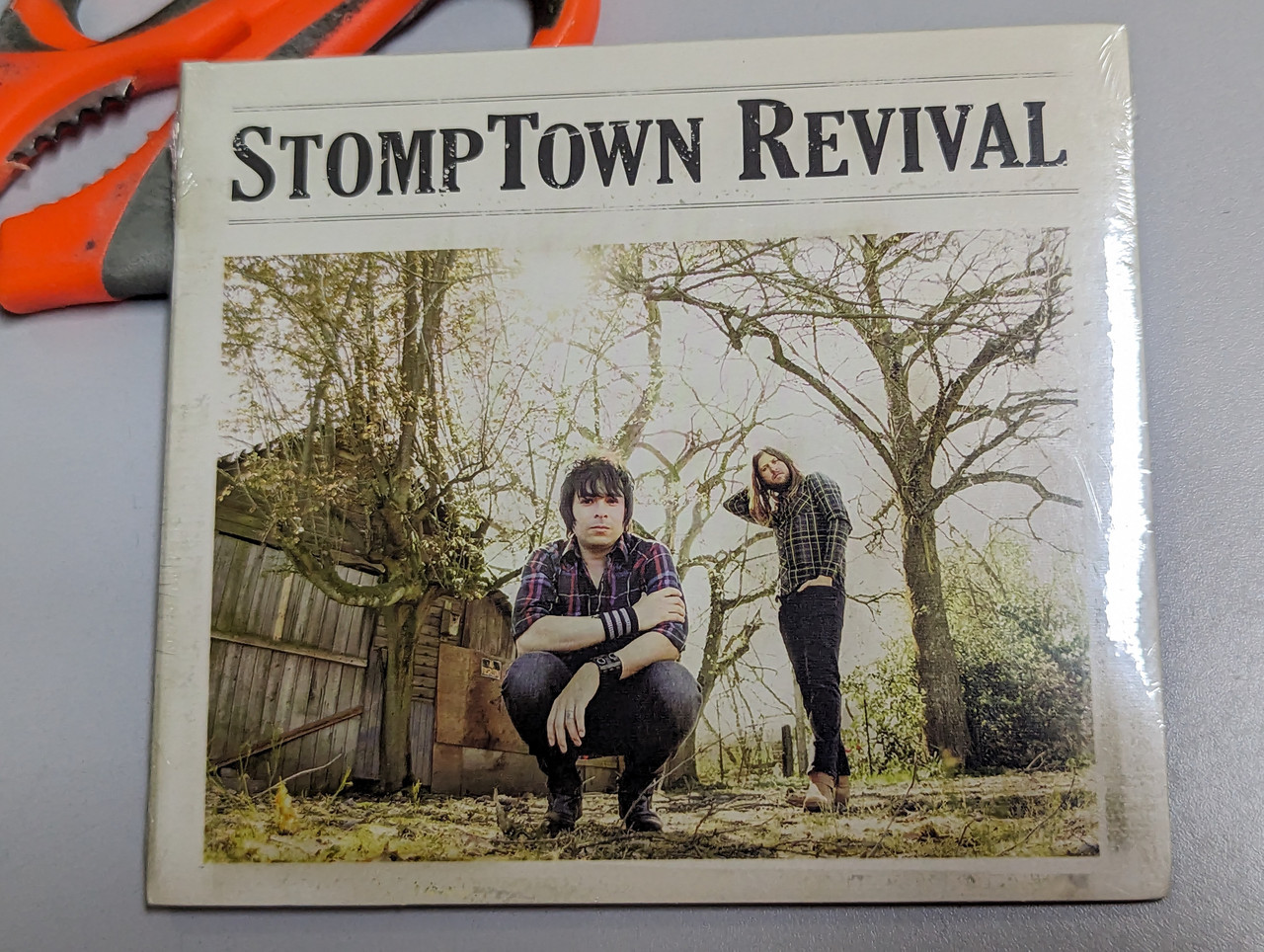 https://cdn10.bigcommerce.com/s-62bdpkt7pb/products/0/images/303097/StompTown_Revival_Save_The_City_Records_Audio_CD_2012_859708395037_1__57392.1696951061.1280.1280.jpg?c=2&_gl=1*41gok7*_ga*MjA2NTIxMjE2MC4xNTkwNTEyNTMy*_ga_WS2VZYPC6G*MTY5Njk0MjMxNy4xMDk1LjEuMTY5Njk1MDUzNy4zMi4wLjA.