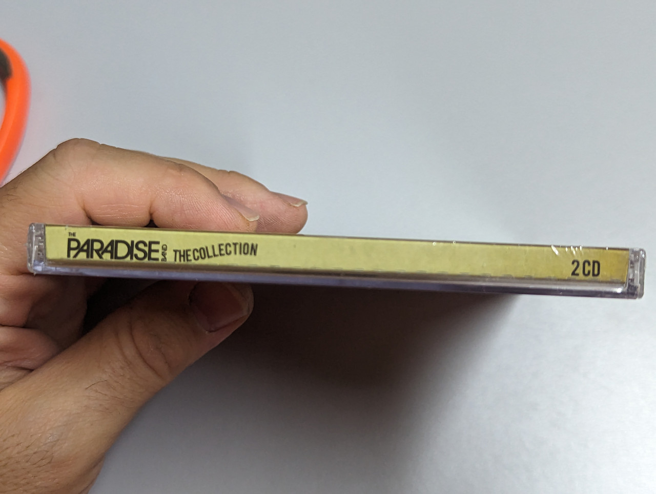 https://cdn10.bigcommerce.com/s-62bdpkt7pb/products/0/images/303109/The_Paradise_Band_The_Collection_Paradise_Entertainment_2x_Audio_CD_2011_3__94574.1696953038.1280.1280.jpg?c=2&_gl=1*1mf7pqj*_ga*MjA2NTIxMjE2MC4xNTkwNTEyNTMy*_ga_WS2VZYPC6G*MTY5Njk0MjMxNy4xMDk1LjEuMTY5Njk1MjYzMC41OS4wLjA.