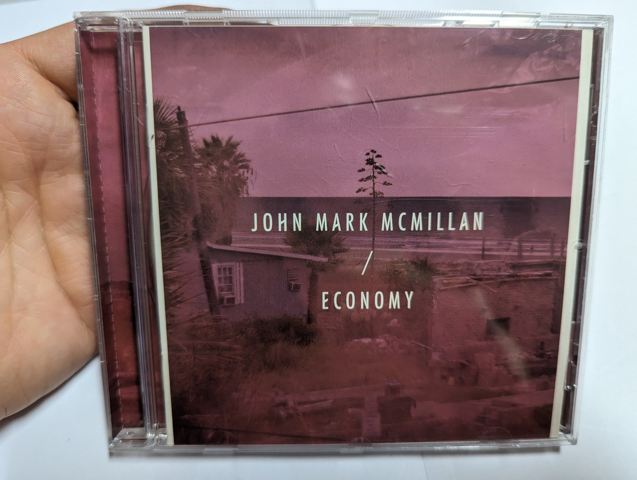 https://cdn10.bigcommerce.com/s-62bdpkt7pb/products/0/images/303422/John_Mark_McMillan_Economy_Integrity_Music_Audio_CD_2011_50202_1__80240.1697041154.1280.1280.jpg?c=2&_gl=1*36m02i*_ga*MjA2NTIxMjE2MC4xNTkwNTEyNTMy*_ga_WS2VZYPC6G*MTY5NzAyOTYwNy4xMDk3LjEuMTY5NzA0MTA5NC42MC4wLjA.