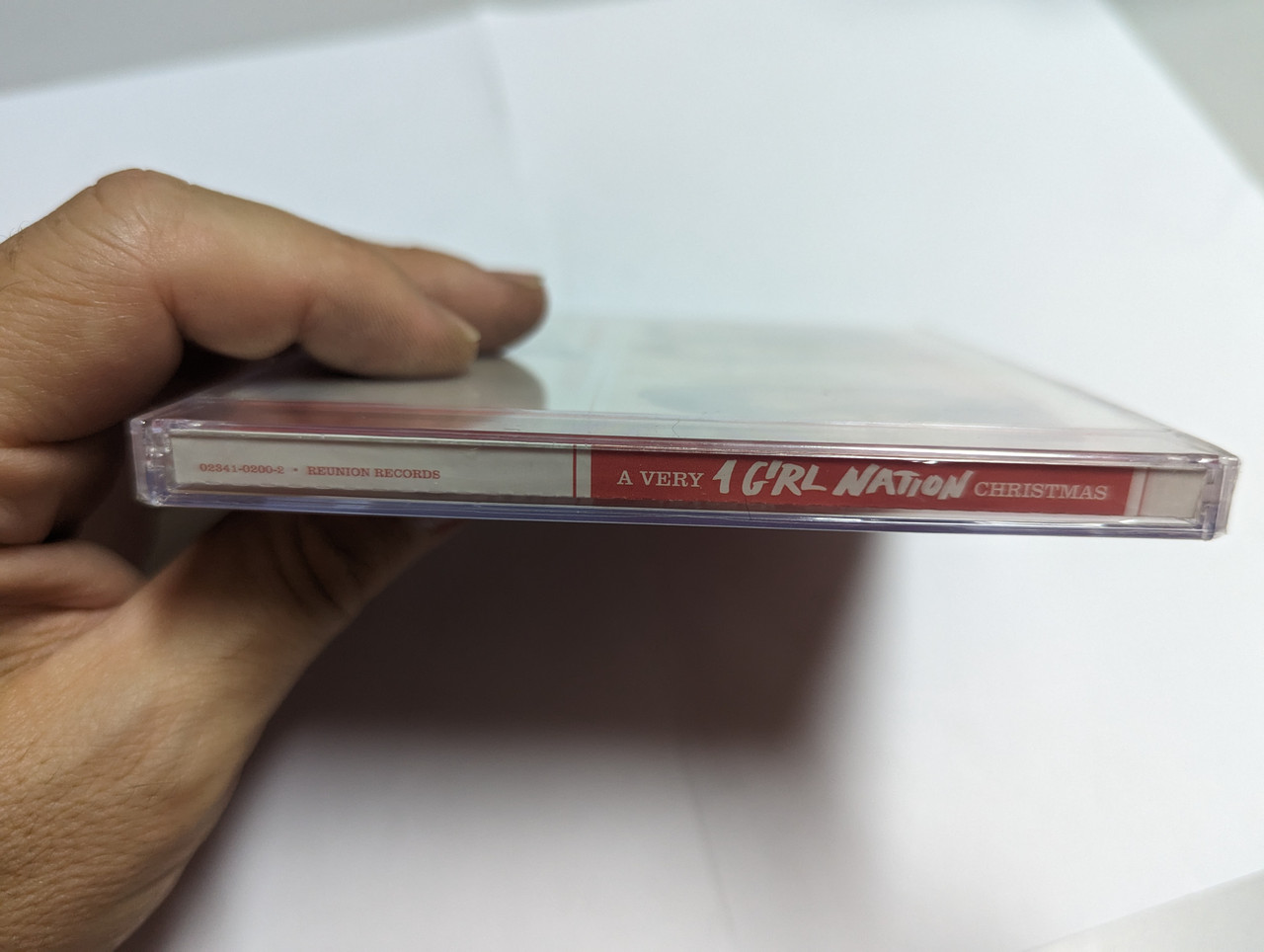 https://cdn10.bigcommerce.com/s-62bdpkt7pb/products/0/images/303532/A_Very_1_Girl_Nation_Christmas_Provident_Label_Group_LLC_Audio_CD_2014_02341-0200-2_3__12027.1697108586.1280.1280.jpg?c=2&_gl=1*ypxby5*_ga*MjA2NTIxMjE2MC4xNTkwNTEyNTMy*_ga_WS2VZYPC6G*MTY5NzA5OTY2MS4xMDk5LjEuMTY5NzEwODMyOC41MS4wLjA.